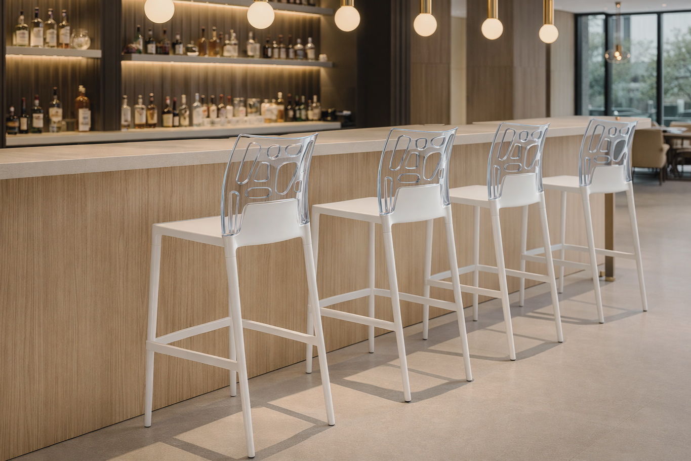 Elegant bar chairs in front of a bar.