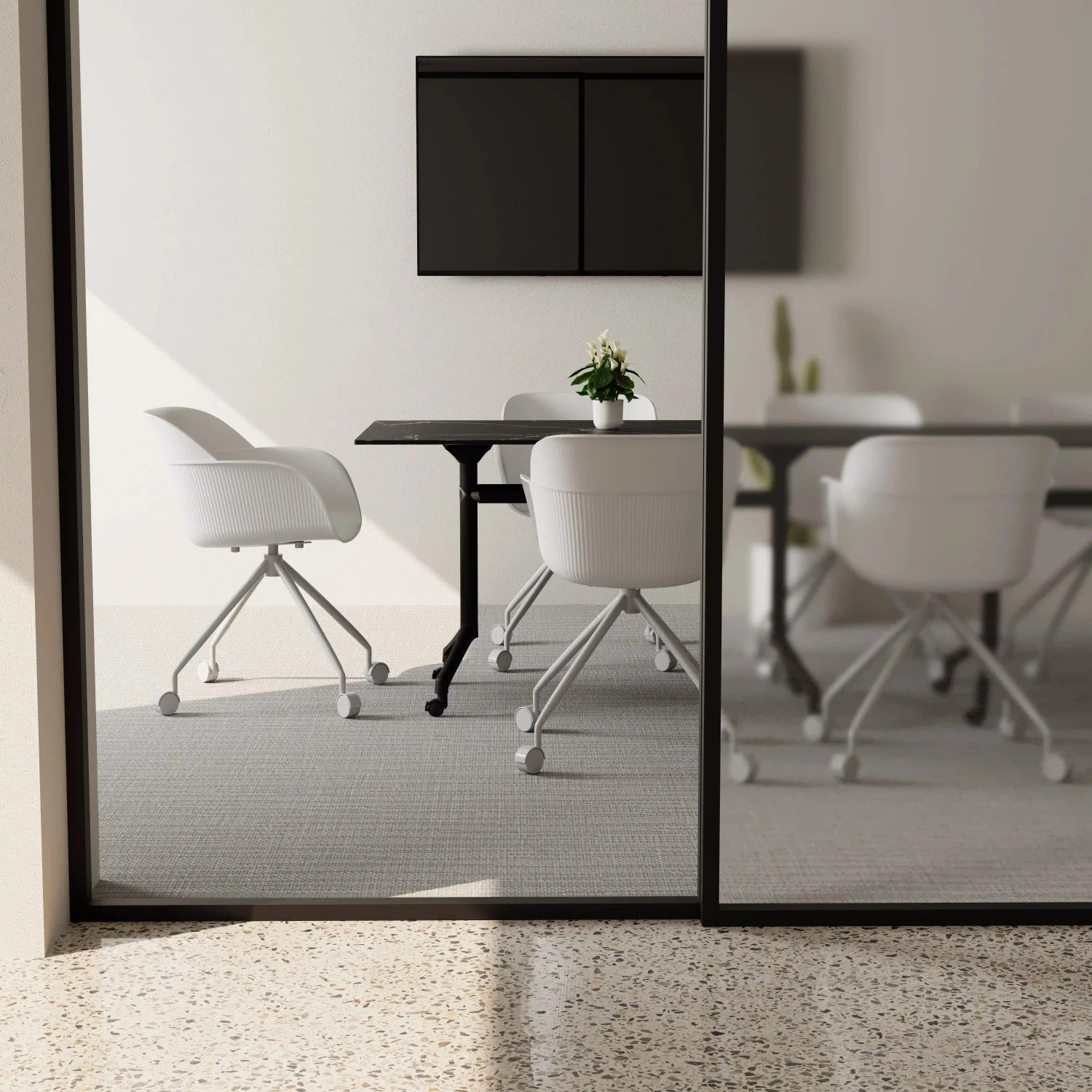 Rolling office chairs around a table