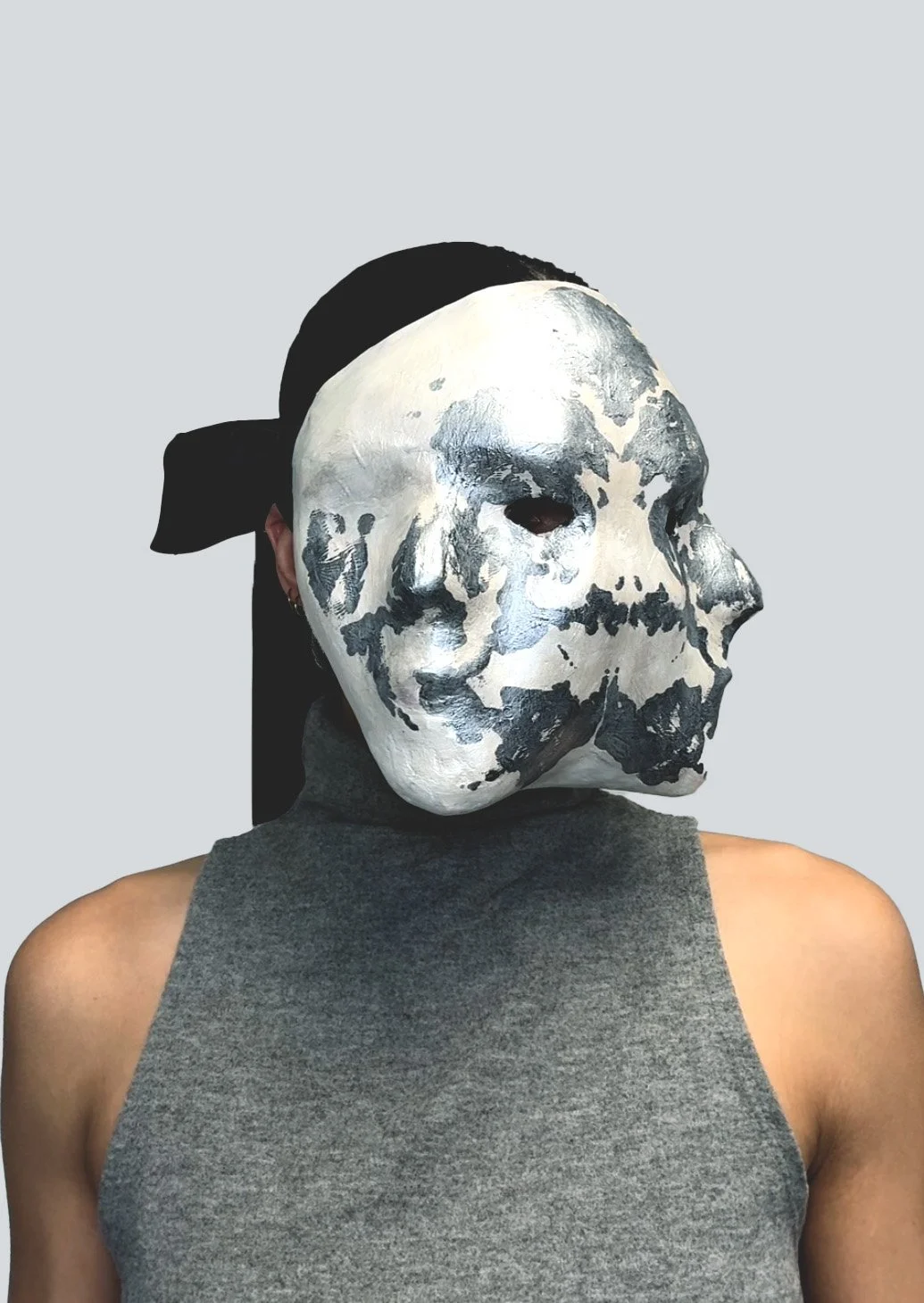 Double face mask painted with a Rorschach test, made from paper mache and plaster by contemporary artist Giana Amantea.