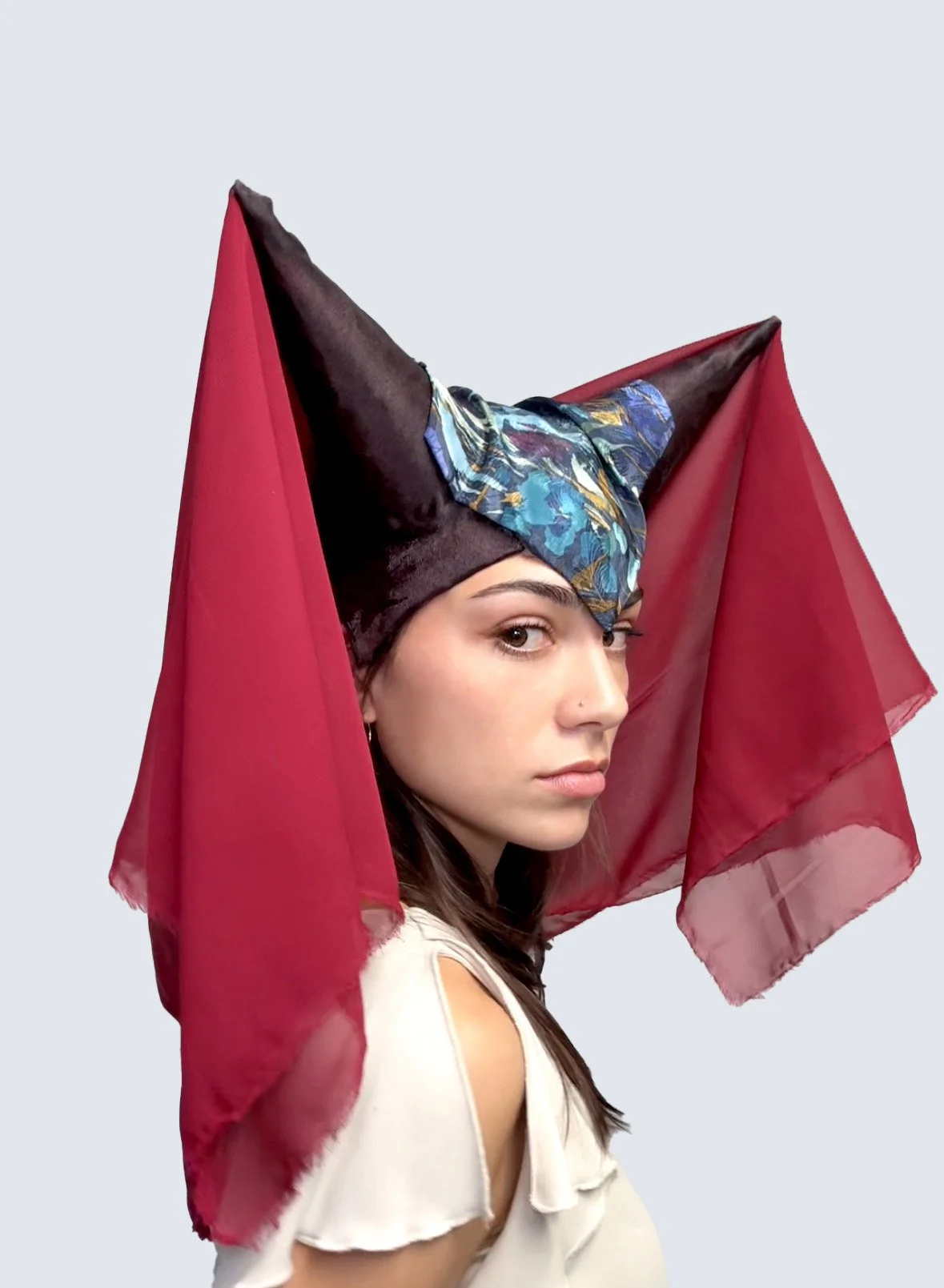 Horned hennin headpiece created from paper mache and fabric by contemporary artist Giana Amantea.
