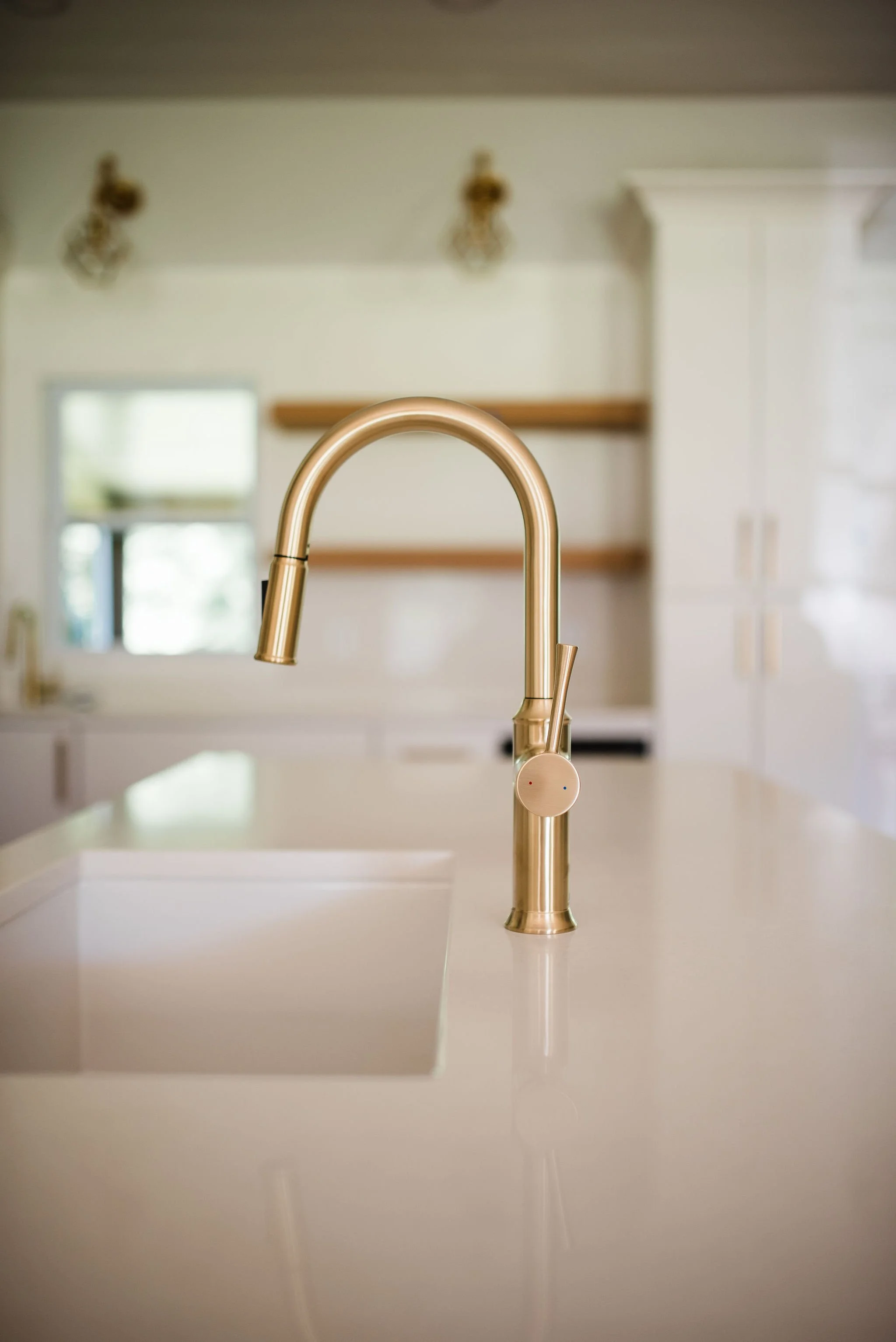 Brass kitchen faucet