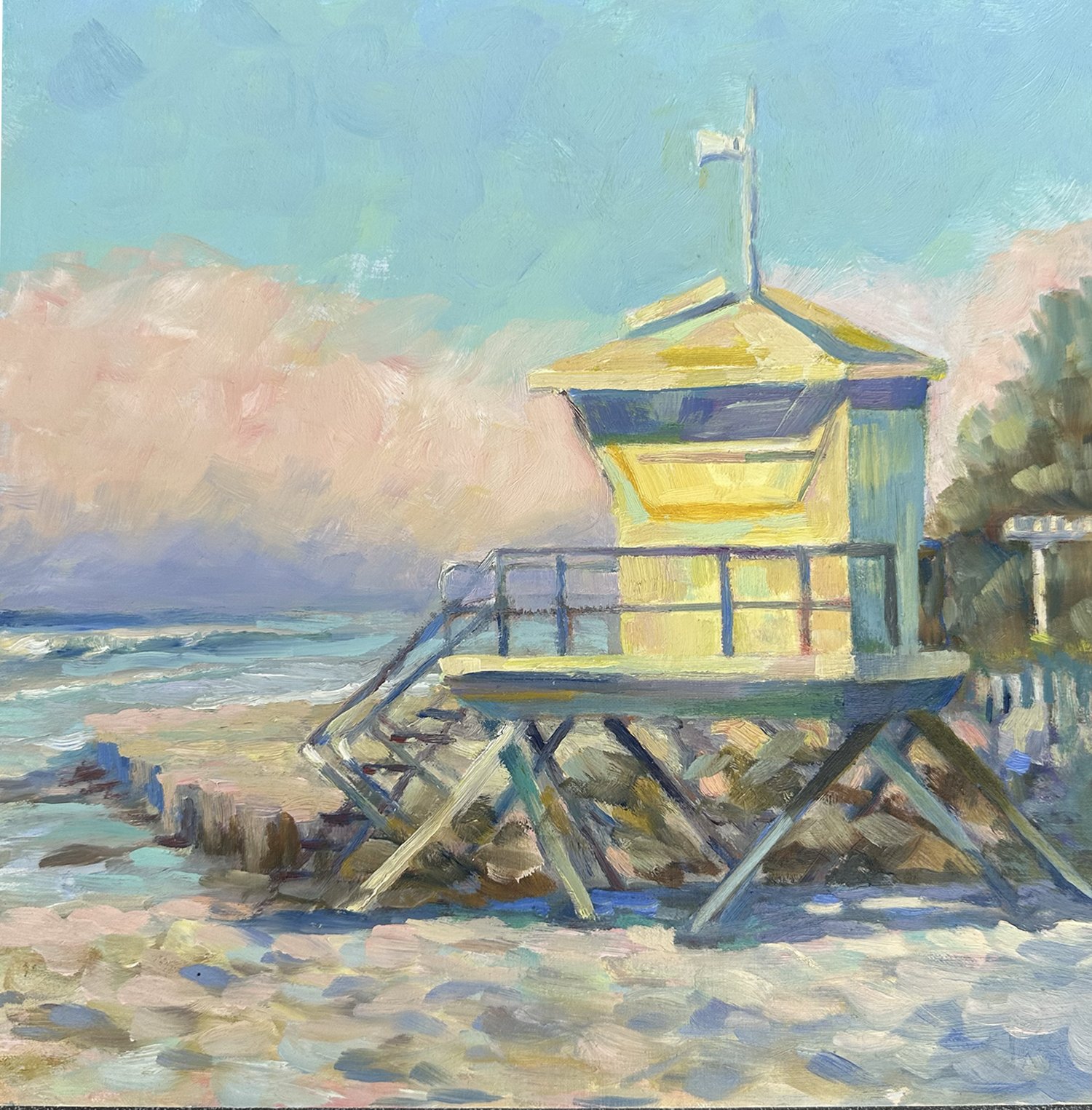 Painting of a lifeguard tower on the beach with waves in the ocean and a sky with soft clouds in the background.