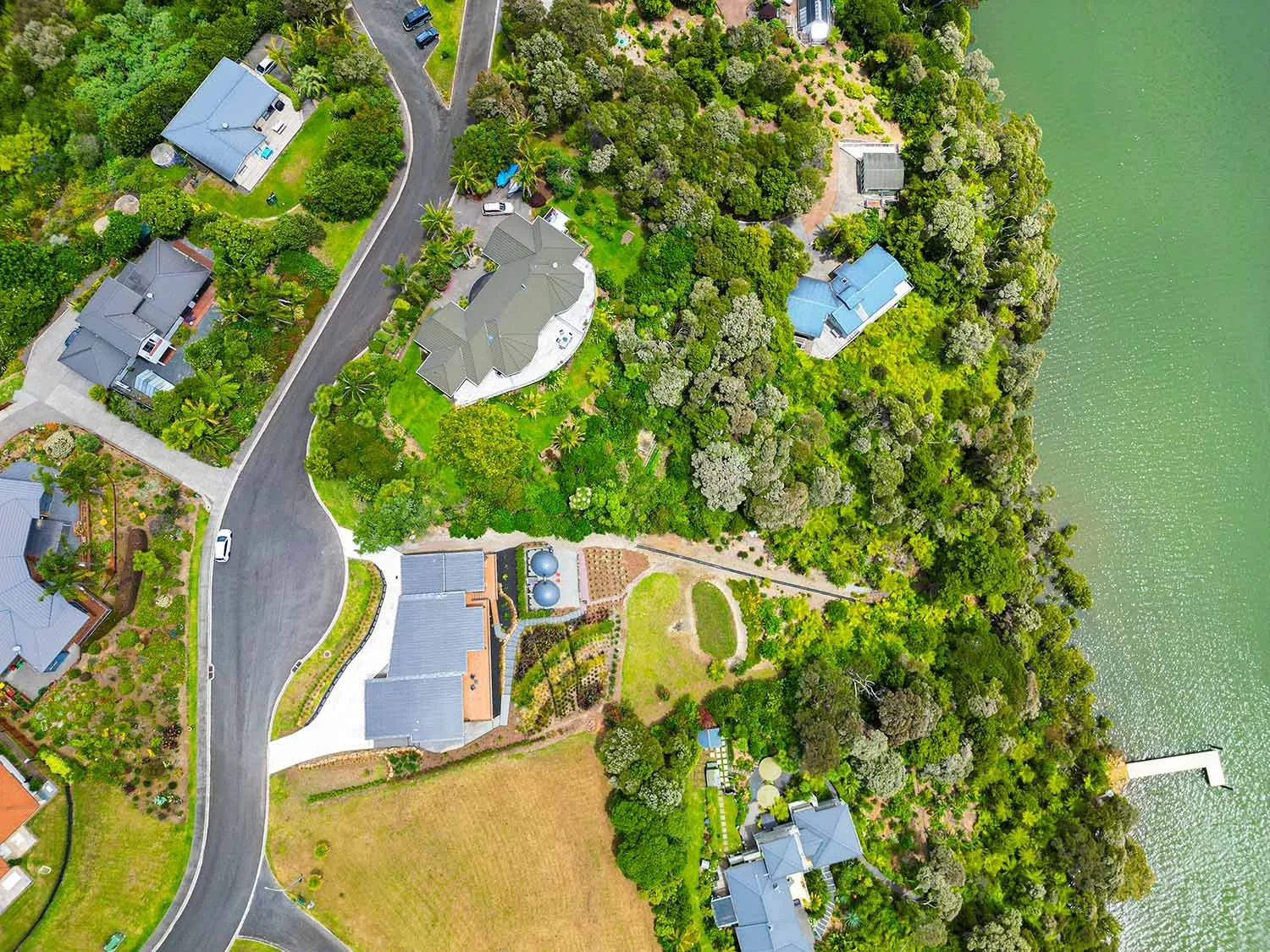 Drone image of property in Northland overlooking bay