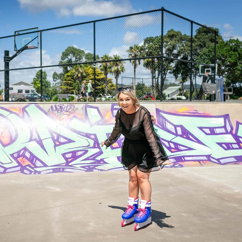 Personal branding image of woman in roller skates at colourful skate park in Kerikeri
