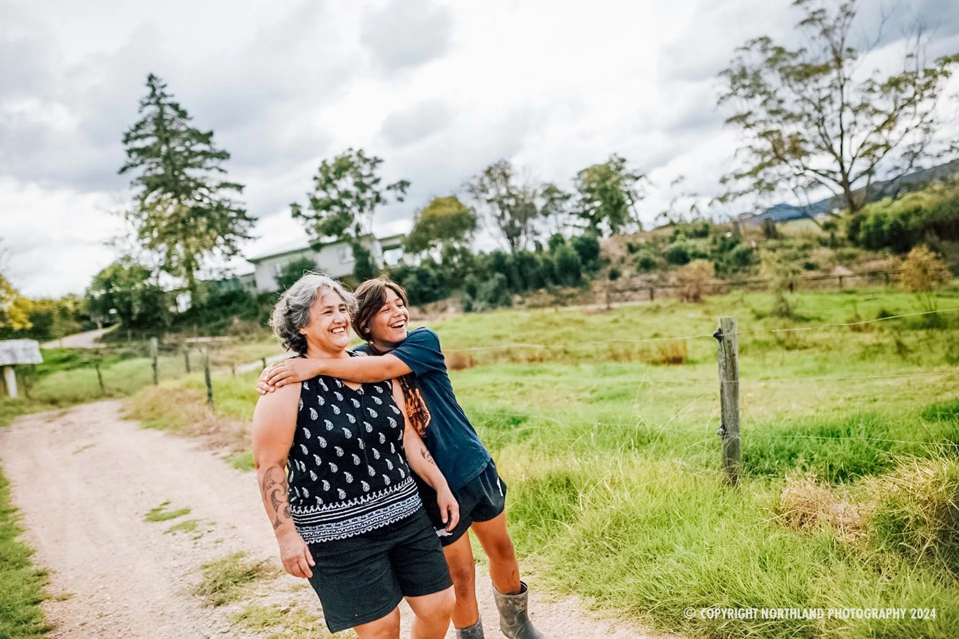 Grandmother and grandson on farm in Northland. All of our images are protected by copyright and available to purchase on True Stock NZ. 