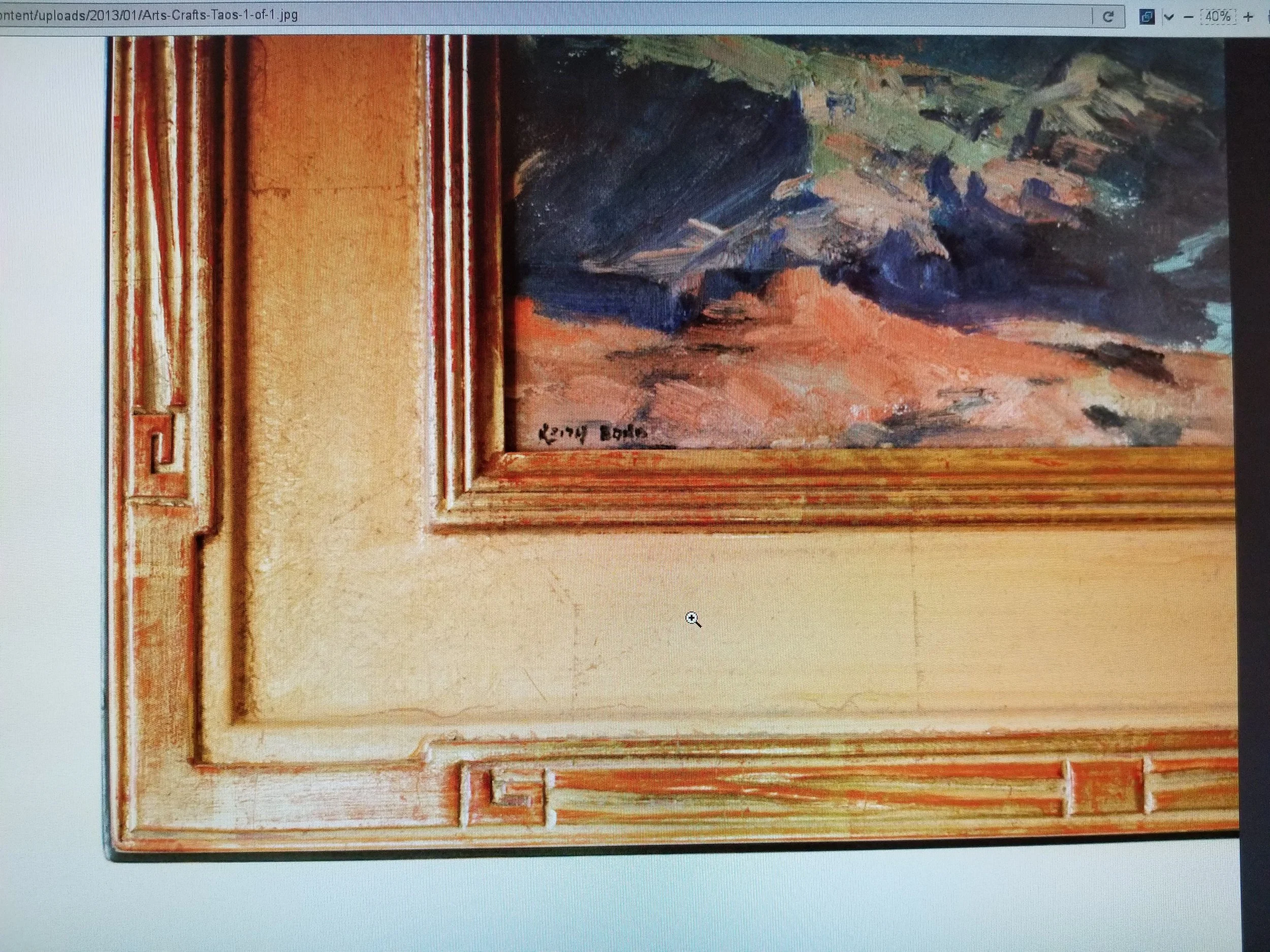 A framed painting with an abstract landscape scene, showing mountains, sky, and terrain, signed by the artist at the bottom left corner.