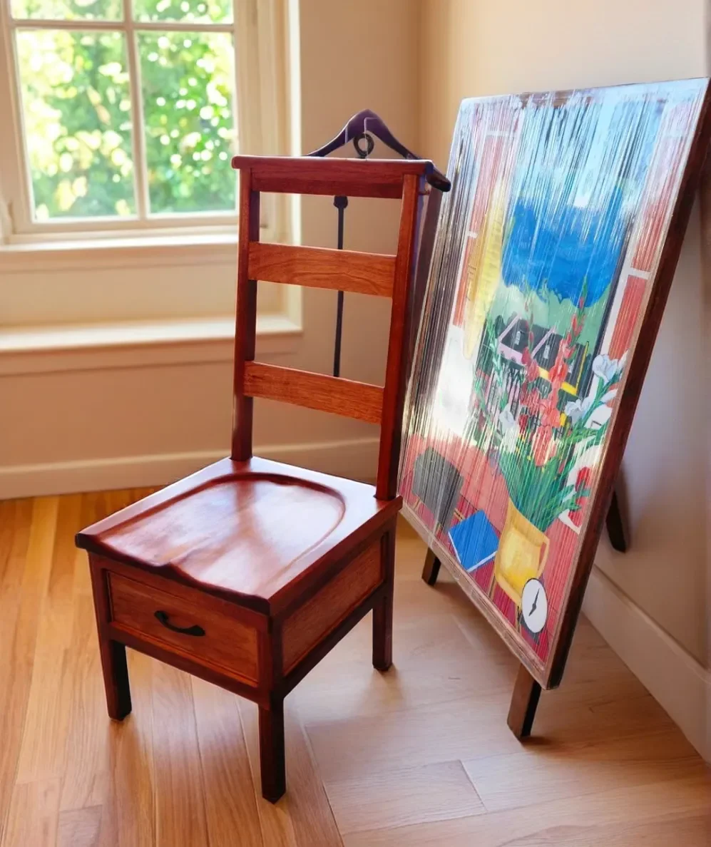 Red Grandis Butlers chair with drawer.