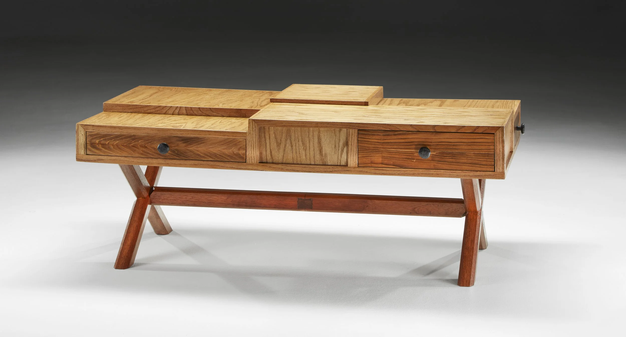 Modern coffee table with stepped top and surround drawers.  Oak and cypress construction.