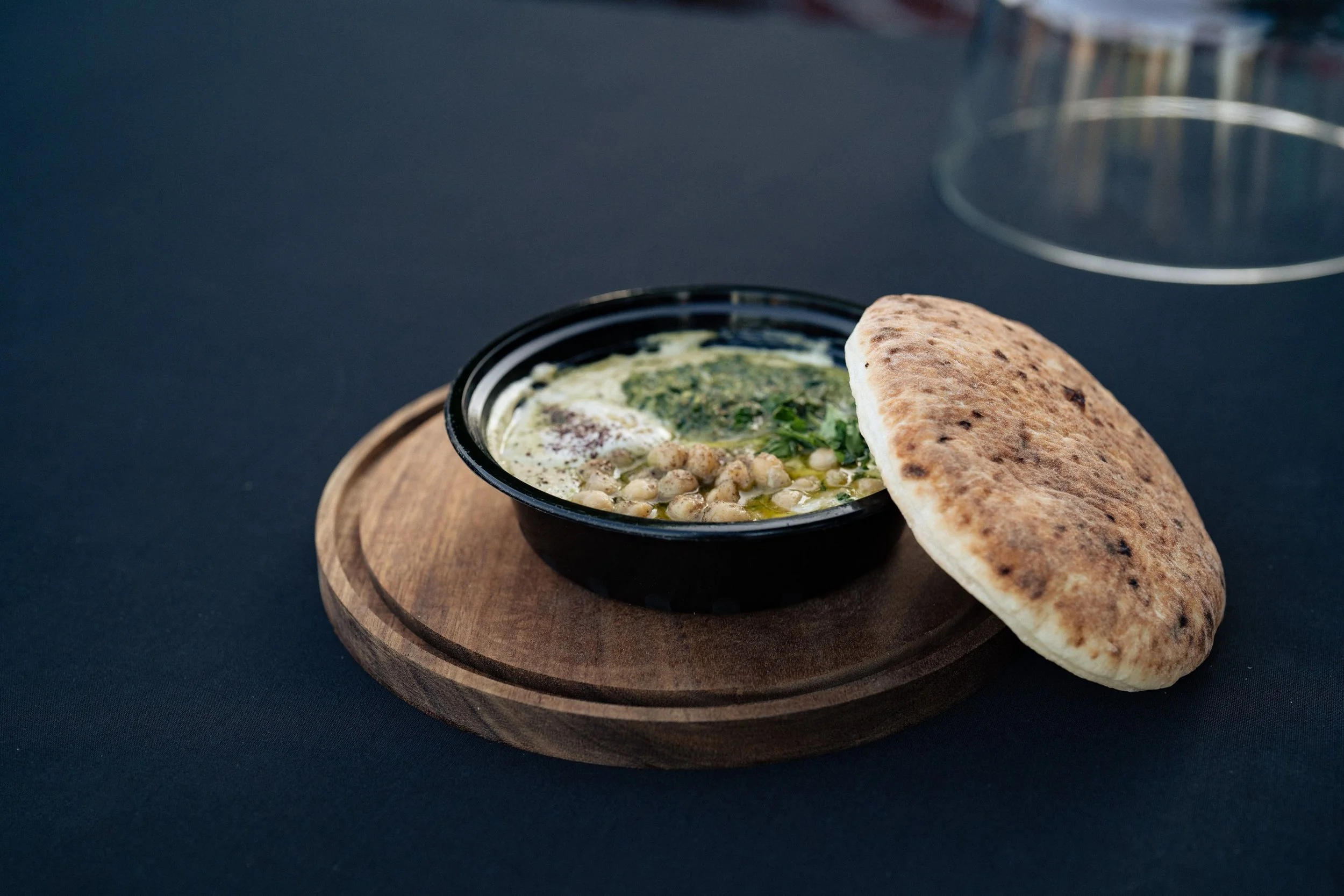 Behold the dynamic duo! Our irresistible hummus bowl meets its perfect match with our authentic pita bread.