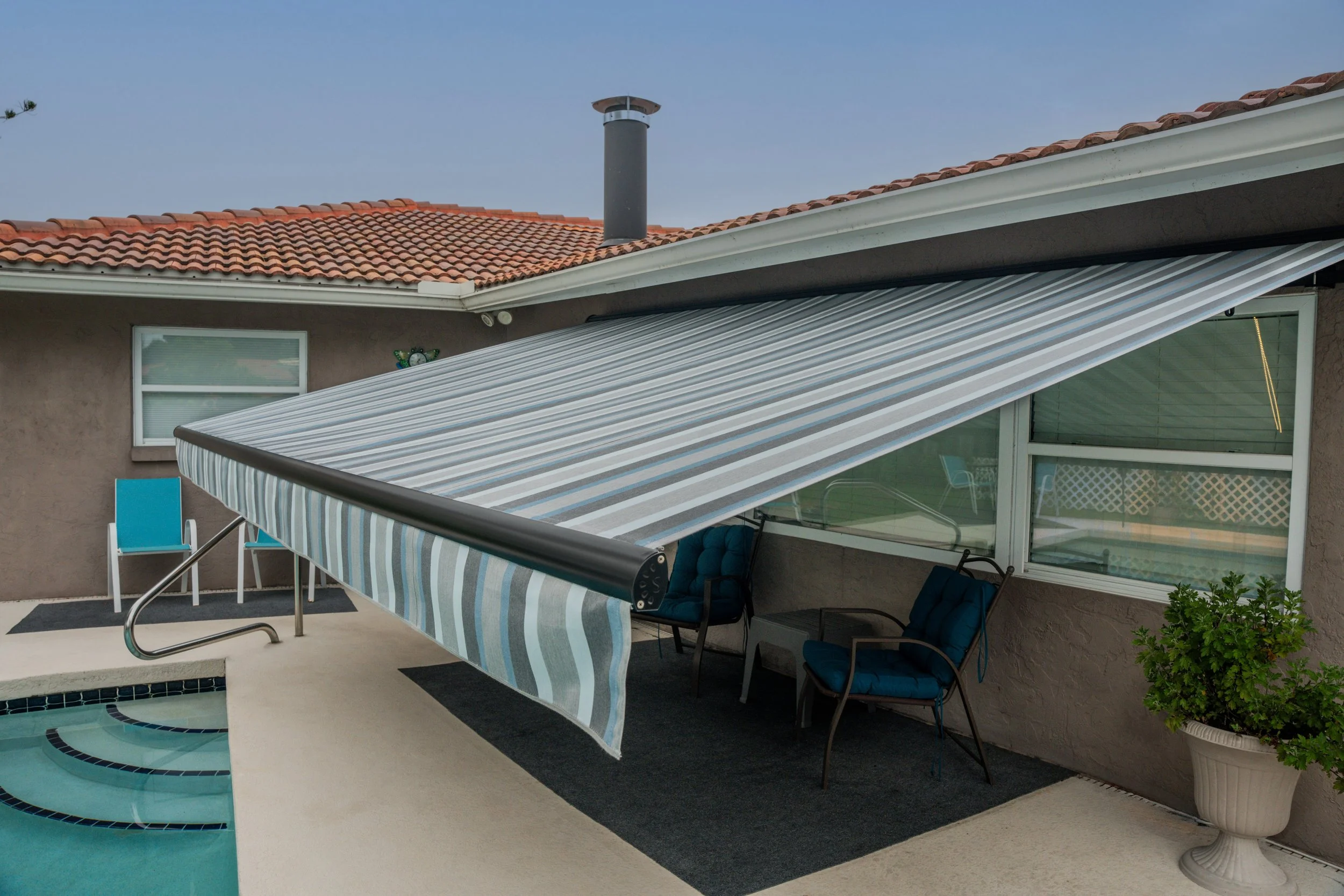 Awning-Residential-TanStucco-TerracottaRoof-MarcoBlueGrey-DSC05440