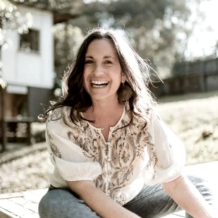 Woman sitting smiling
