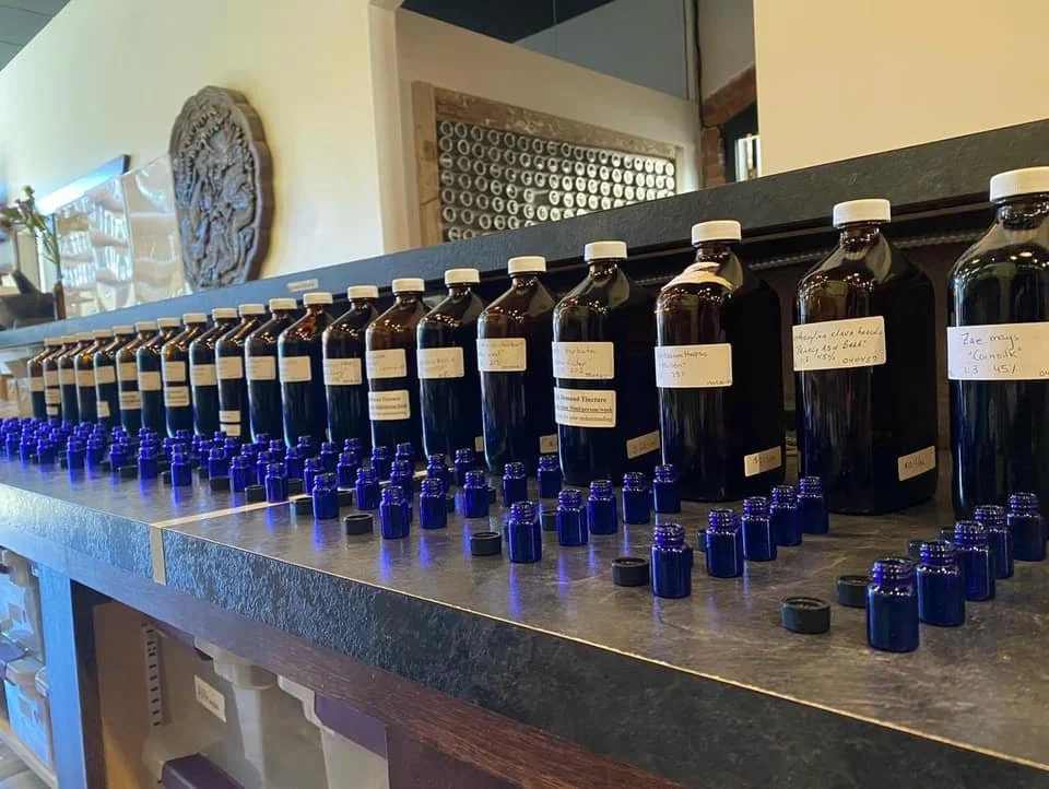 Various tincture bottles lined up in a row