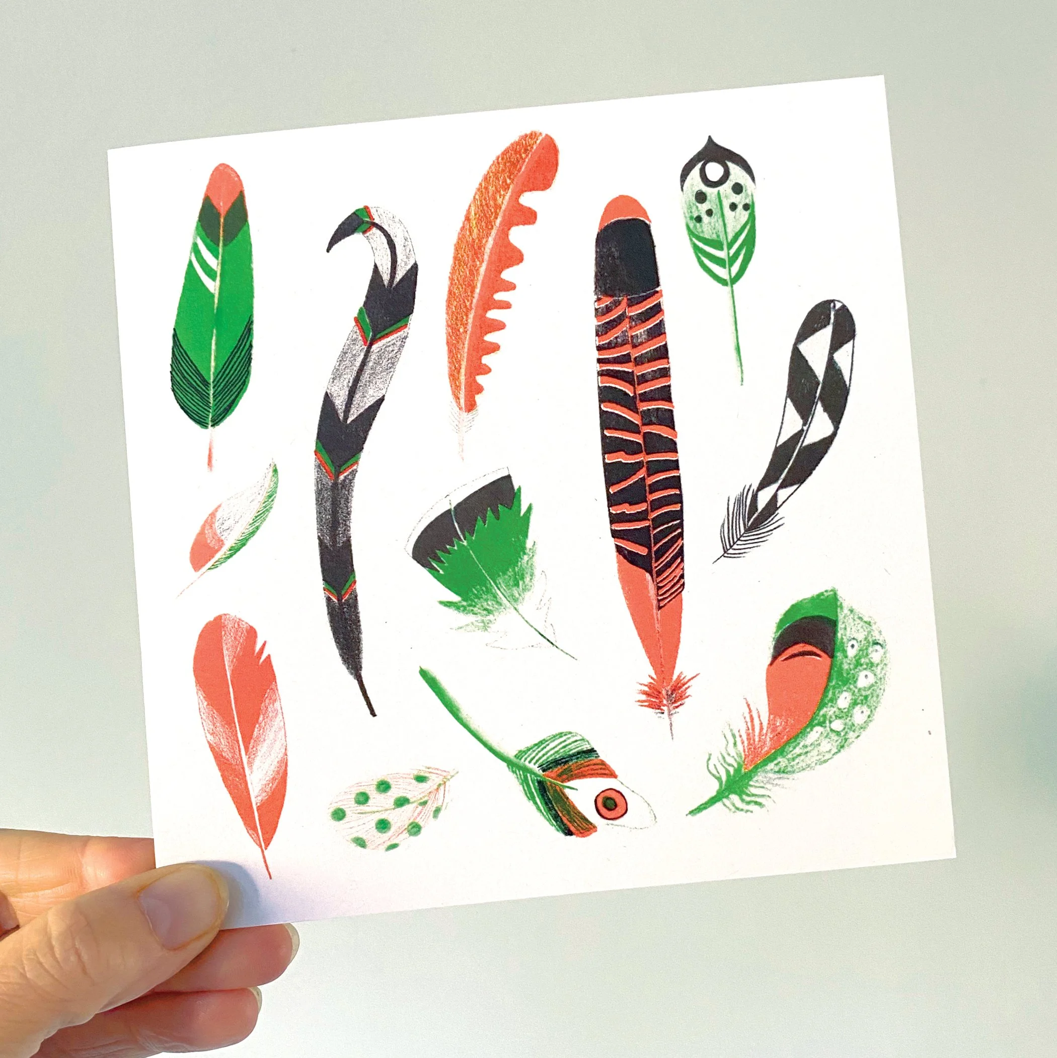 Ellie-Good-FEATHERS-card-hand-LOW.jpg