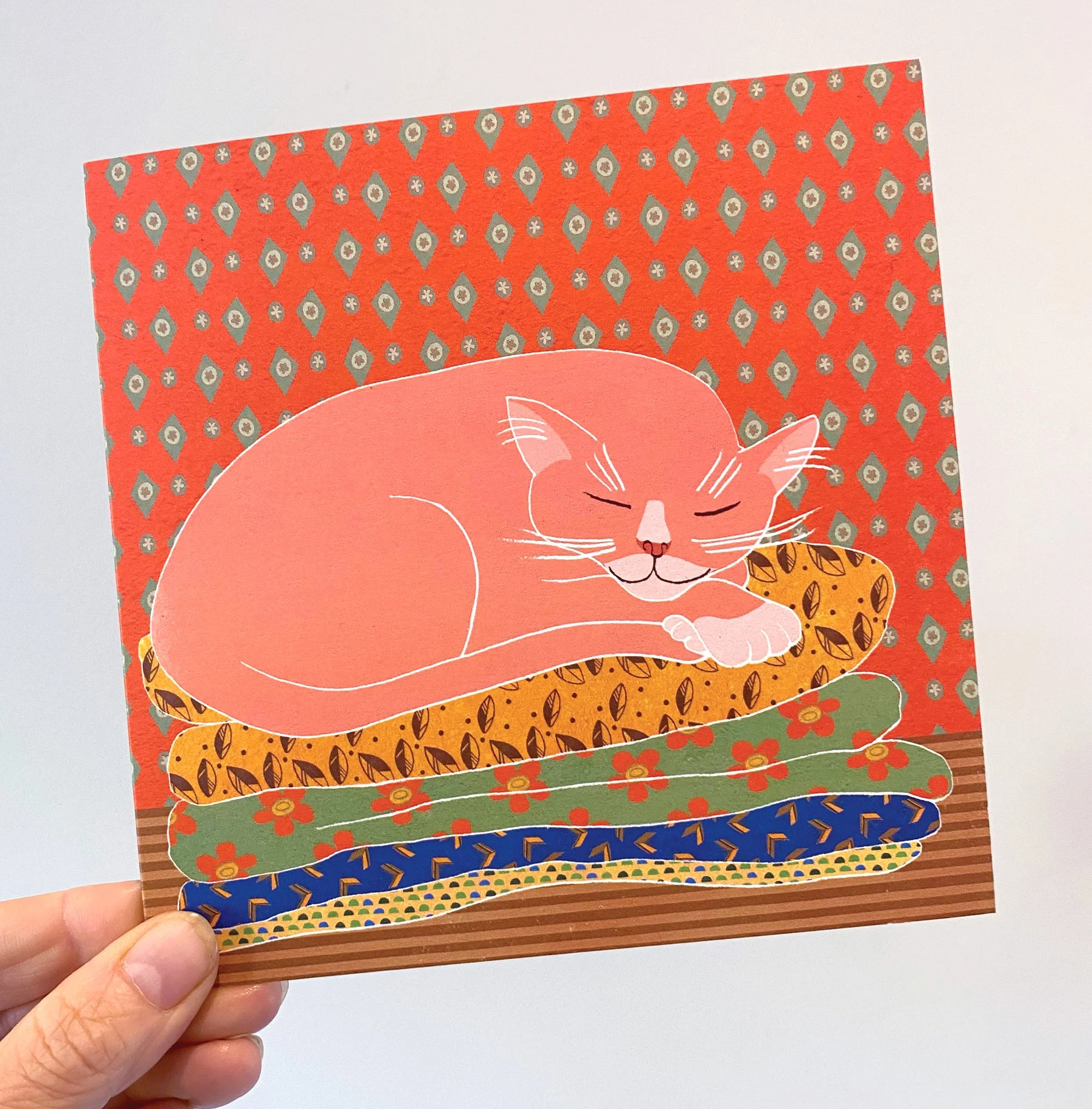 pink-cat-in-hand-LOW.jpg