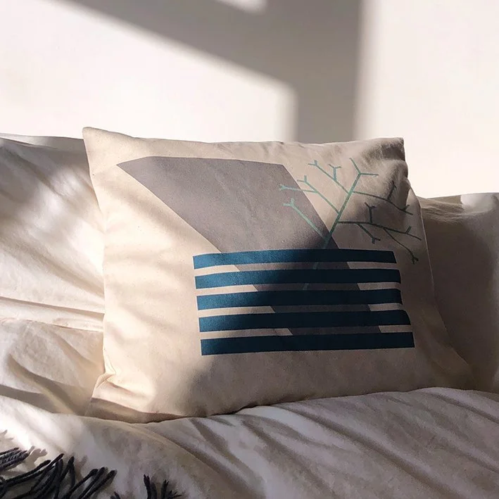 Scandi_cushion_on-bed_2_web.jpg