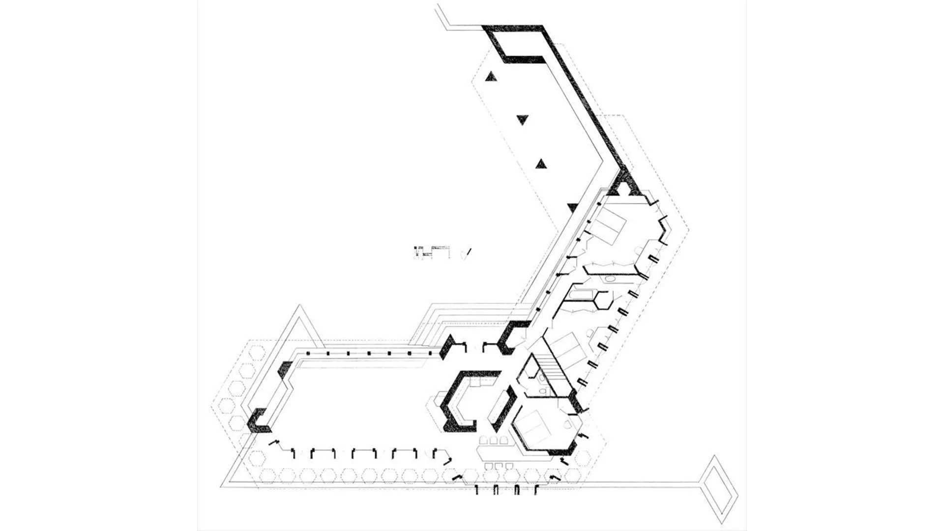 Architectural floor plan drawing showing layouts, walls, rooms, and structures with black accents on a white background.