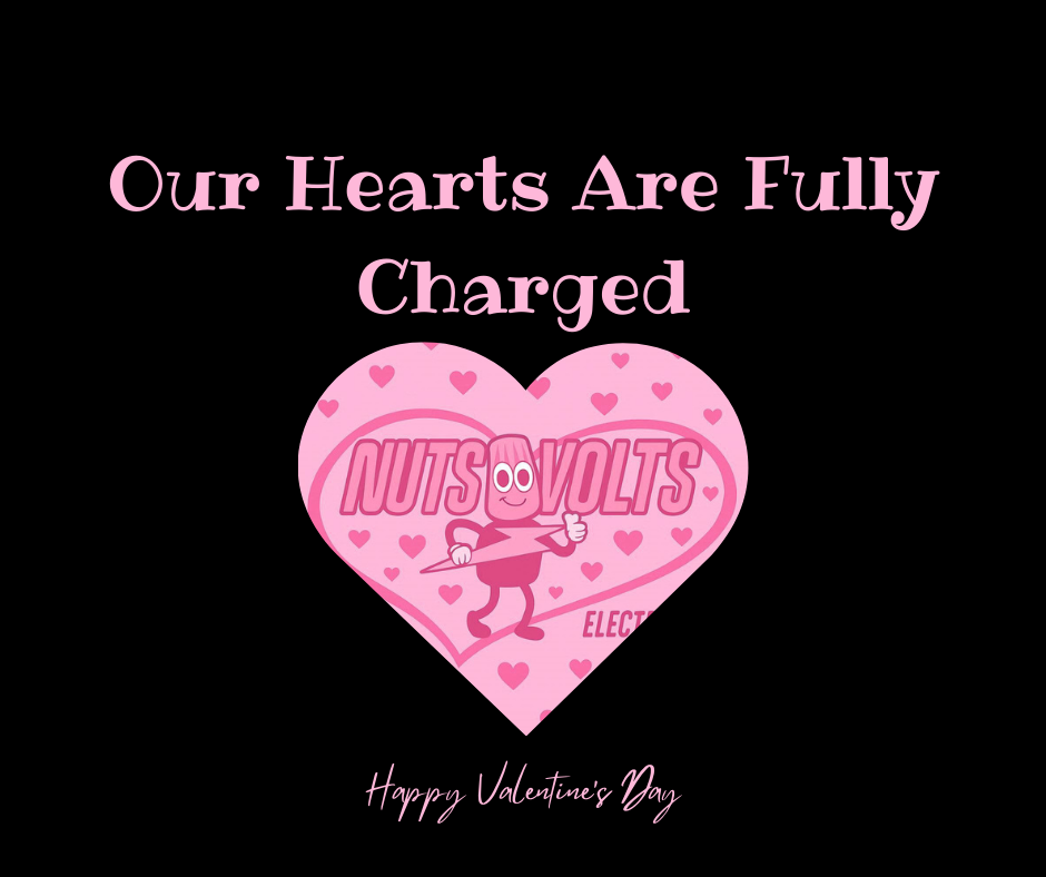 A Valentine's Day greeting with a pink heart featuring a cartoon character and the text "Nuts Volt". The message reads "Our Hearts Are Fully Charged" and "Happy Valentine's Day" on a black background.