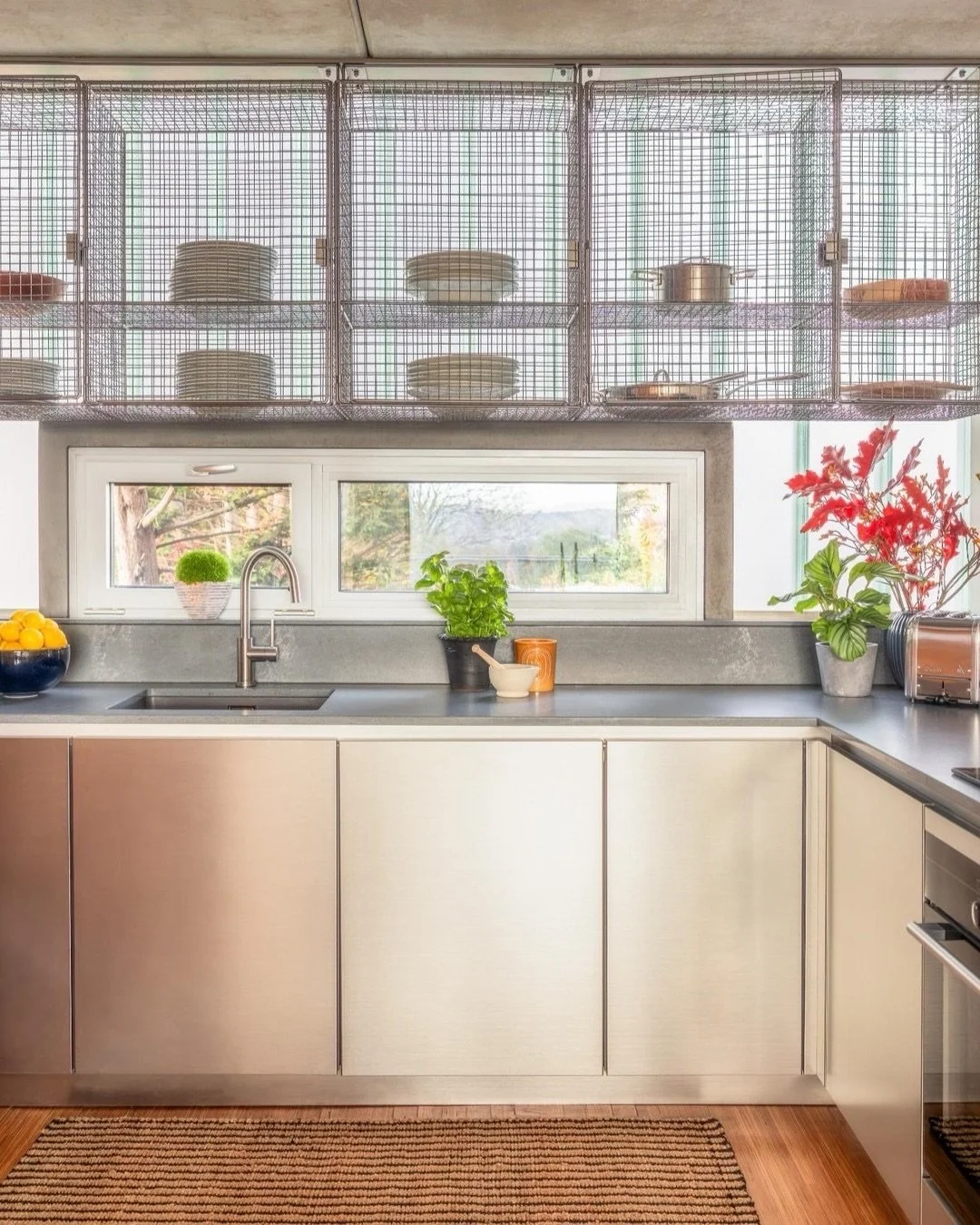 Our latest project: A bold, ultra-modern bachelor&rsquo;s kitchen brought to life. We kept the original wire cabinets - a signature detail that filters the light beautifully while preserving the industrial edge of this architectural home.
⠀⠀⠀⠀⠀⠀⠀⠀⠀
I