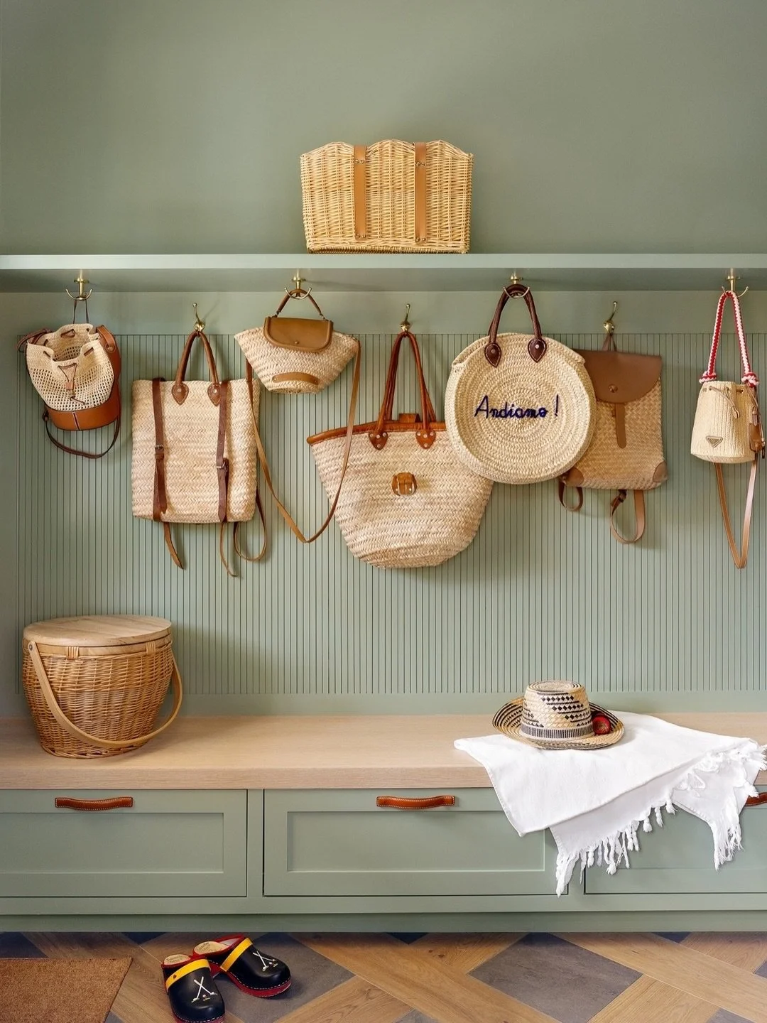 A mud room of dreams featuring our client&rsquo;s pooch @iampepperthedog and their amazing collection of beach bags, baskets and hats! The beautiful green paint is @benjaminmoore Summer&rsquo;s Day
⠀⠀⠀⠀⠀⠀⠀⠀⠀
Photos by @hayleyellenday 💚
⠀⠀⠀⠀⠀⠀⠀⠀⠀
-
⠀