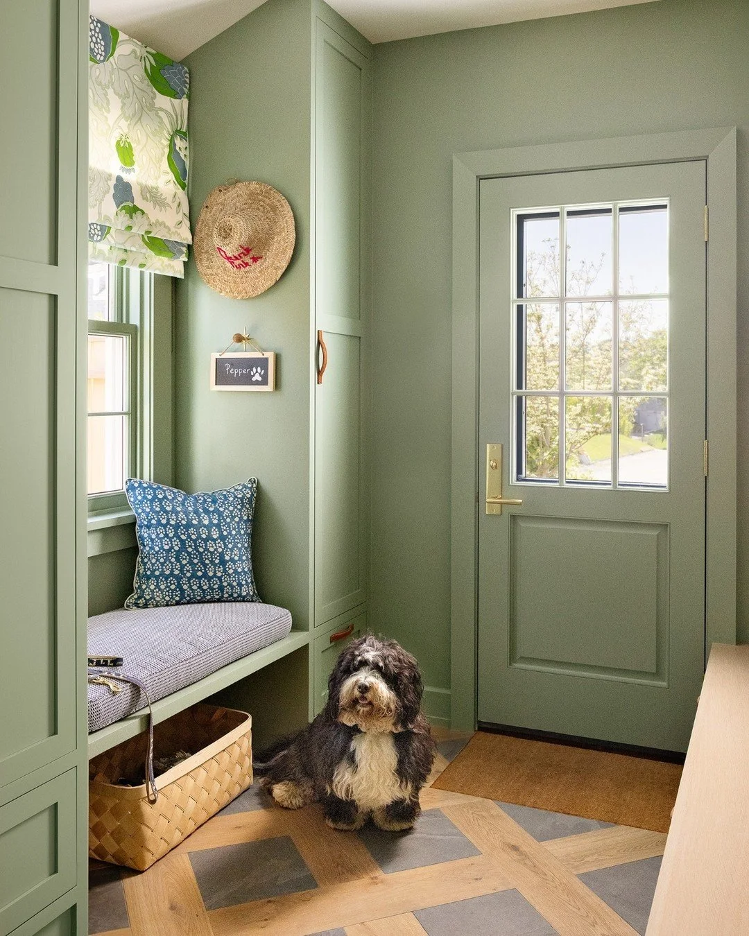 A mud room of dreams featuring our client's pooch @iampepperthedog and his fabulous 'woof bar'! The beautiful green paint is @benjaminmoore Summer&rsquo;s Day

Photos by @hayleyellenday 💚

-

#mudroom #nantucketsummerhouse #summerhouse #nantucketsty
