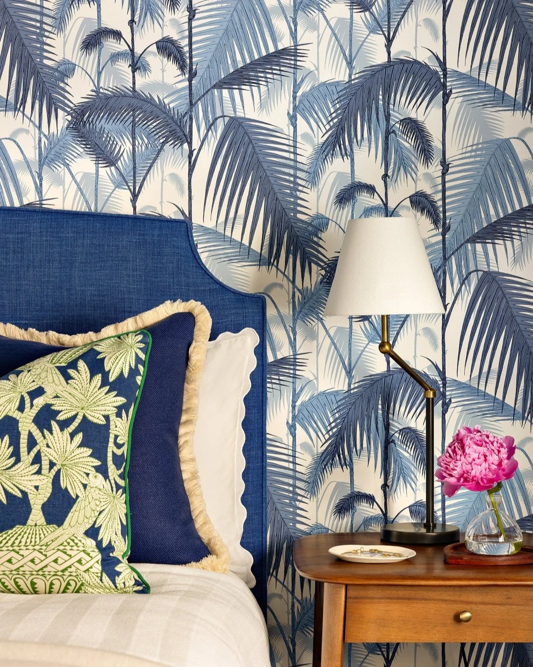A guest room inspired by Palm Beach in the lower ground floor of our Nantucket summer house project 🌴

We wanted to create a playful, vibrant vibe inspired by our client&rsquo;s time in Palm Beach. The bold and breezy Palm Jungle wallpaper by @cole_