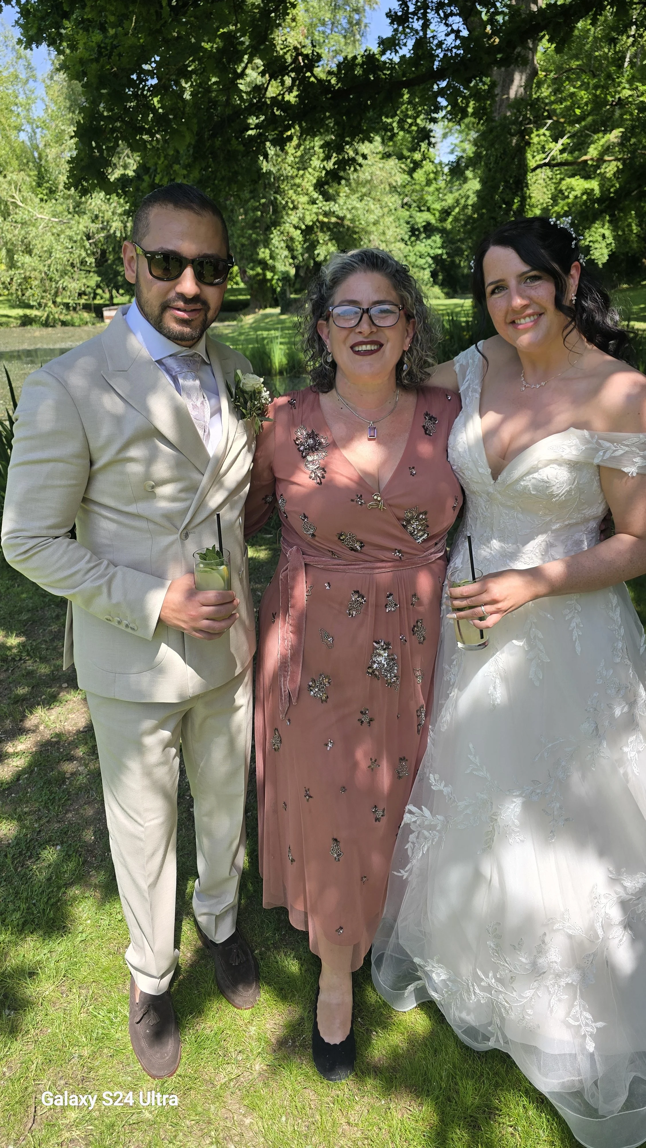 NaomiJane here at The Water's Edge in the Cotswolds just after marrying these two with their family and friends in attendance.