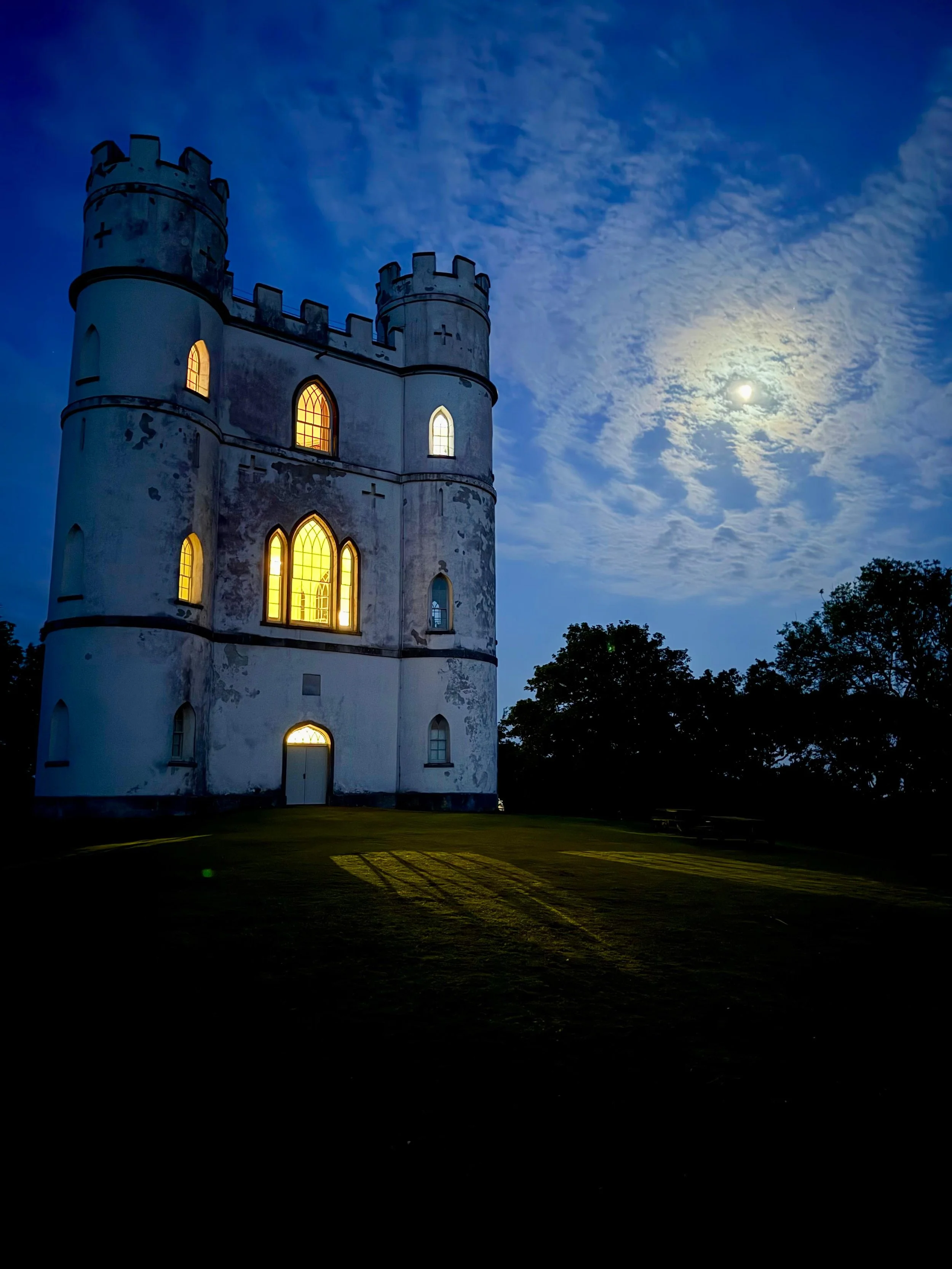 Lawrence Castle at night.