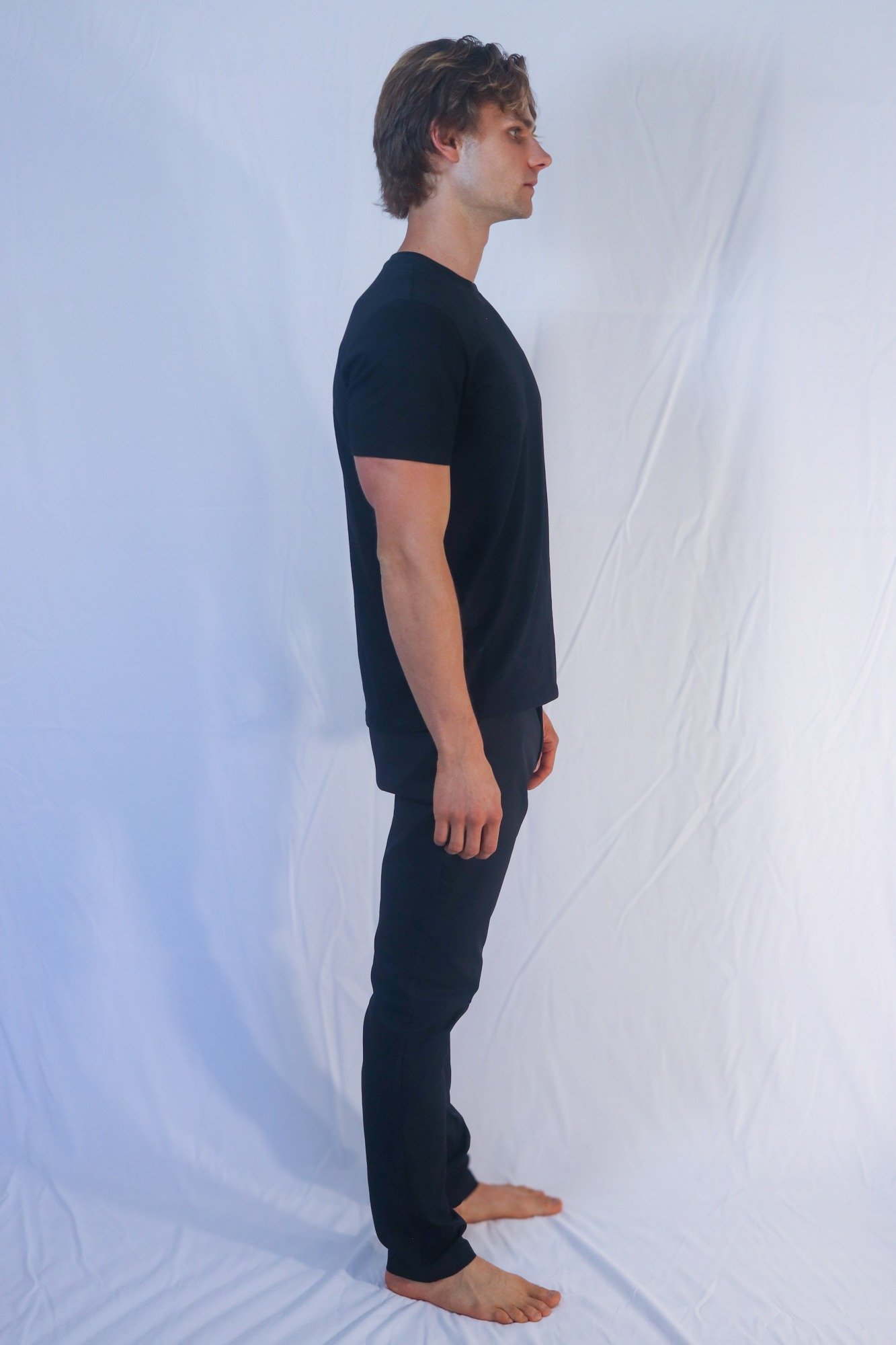 Stepan Salomatin — full-length side view. Current unretouched digital.