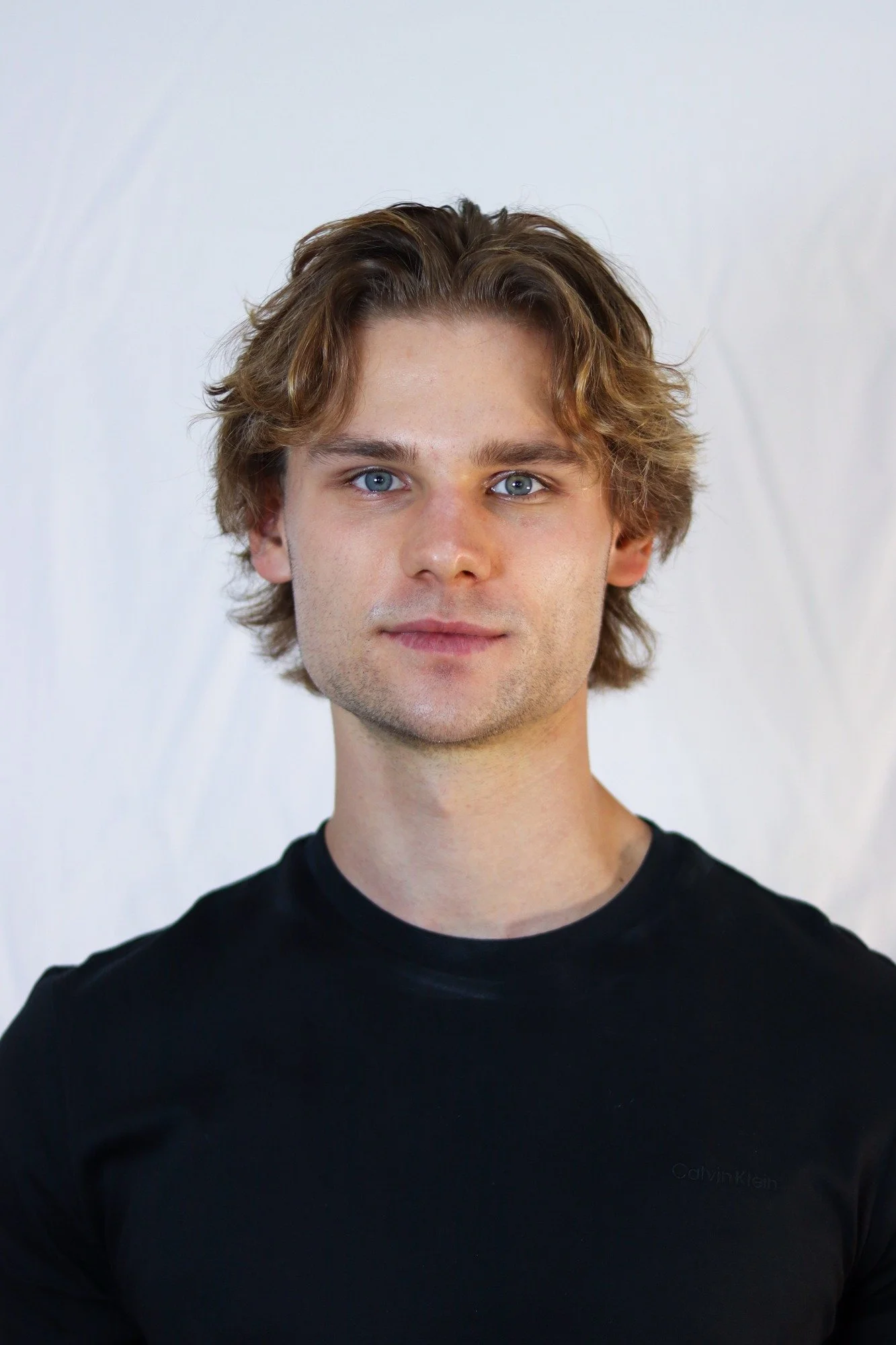 Stepan Salomatin — relaxed headshot. Current unretouched digital.