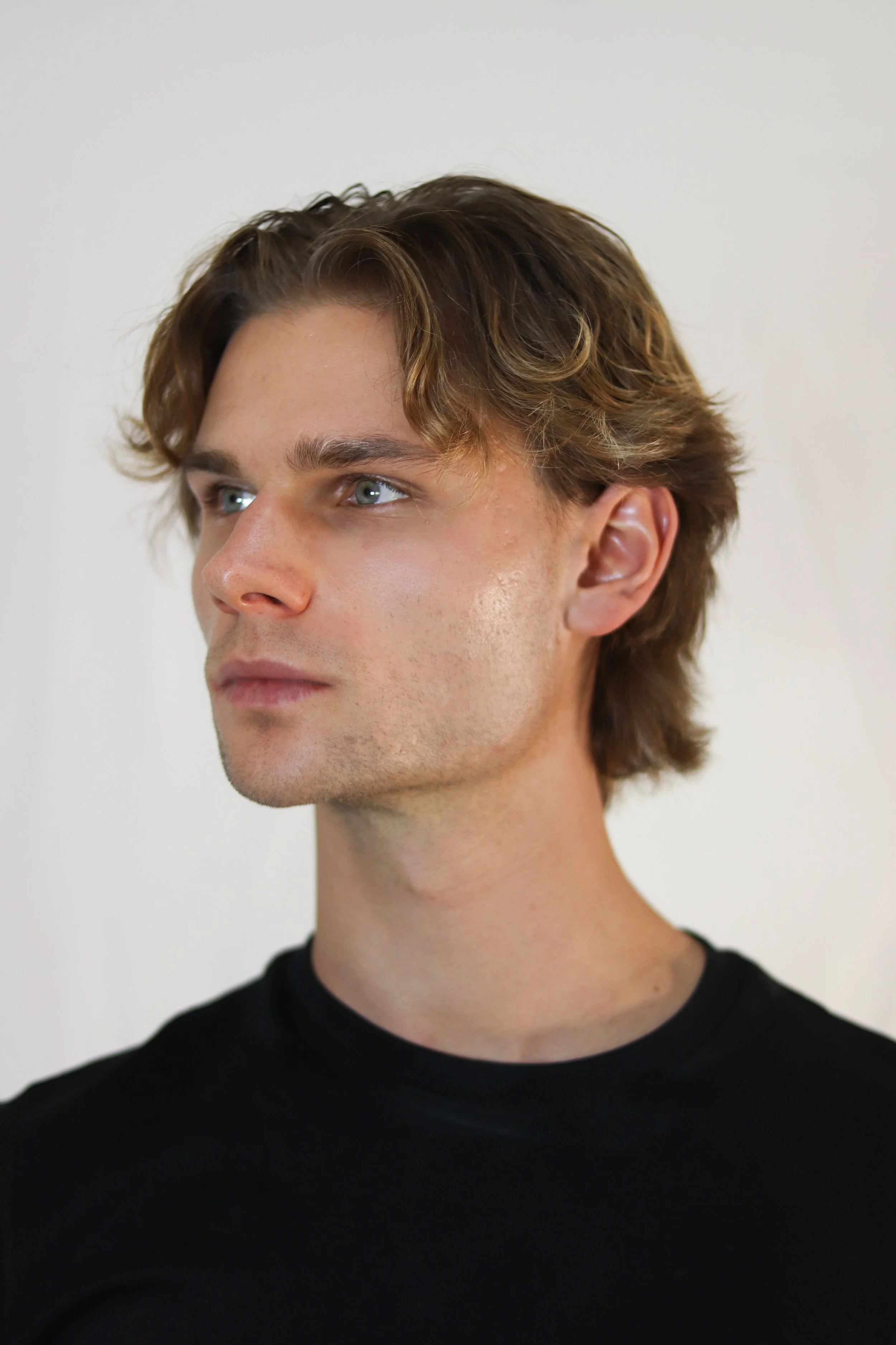Stepan Salomatin — three-quarter headshot. Current unretouched digital.