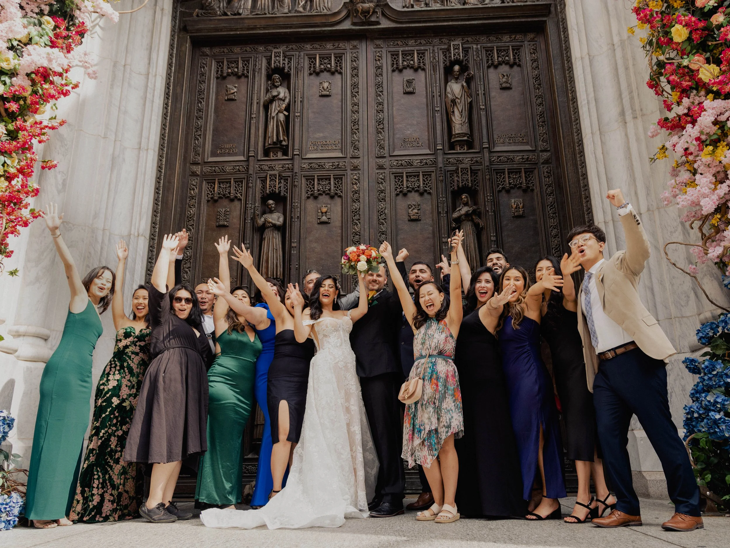 Radiant newlyweds and joyful guests gather outside St. Patrick's Cathedral, capturing a magical moment of celebration and love.