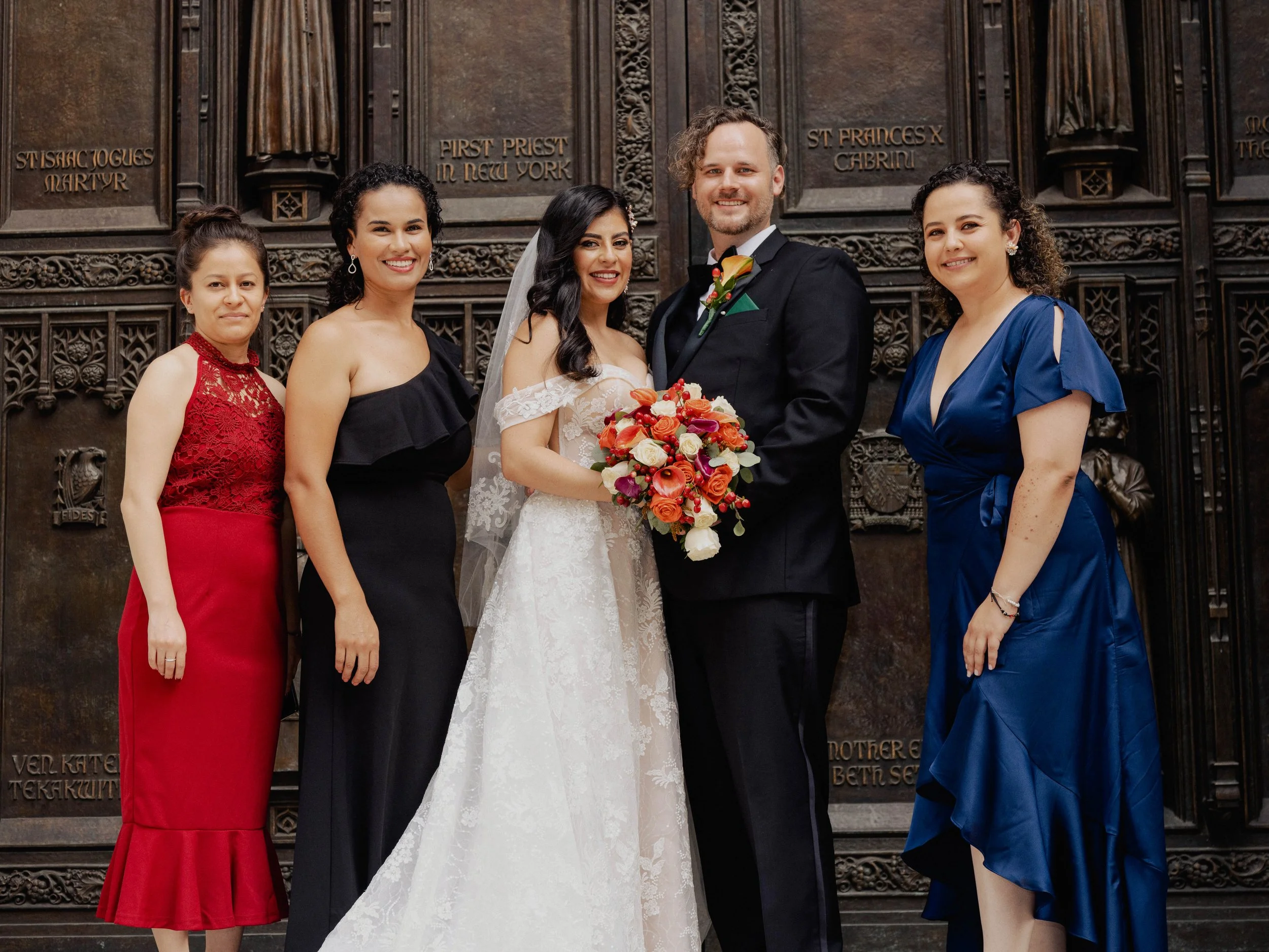 Radiant newlyweds and joyful guests gather outside St. Patrick's Cathedral, capturing a magical moment of celebration and love.