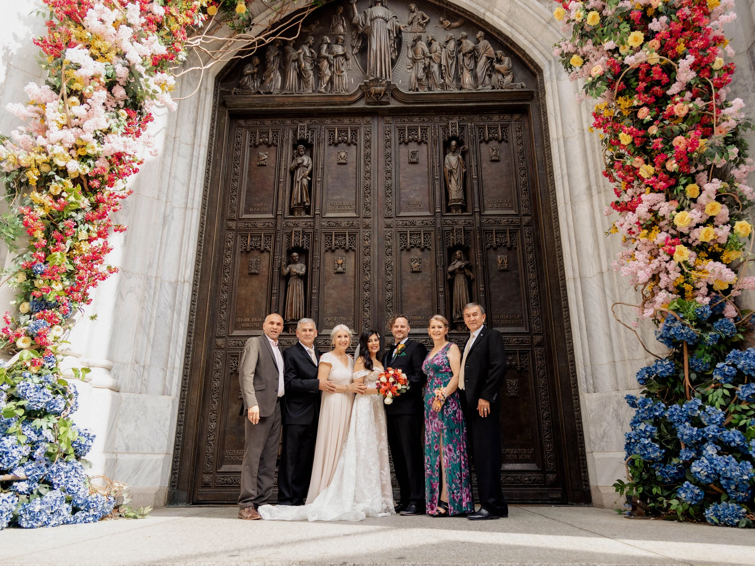 Radiant newlyweds outside St. Patrick's Cathedral after the wedding ceremony, capturing a magical moment of celebration and love.
