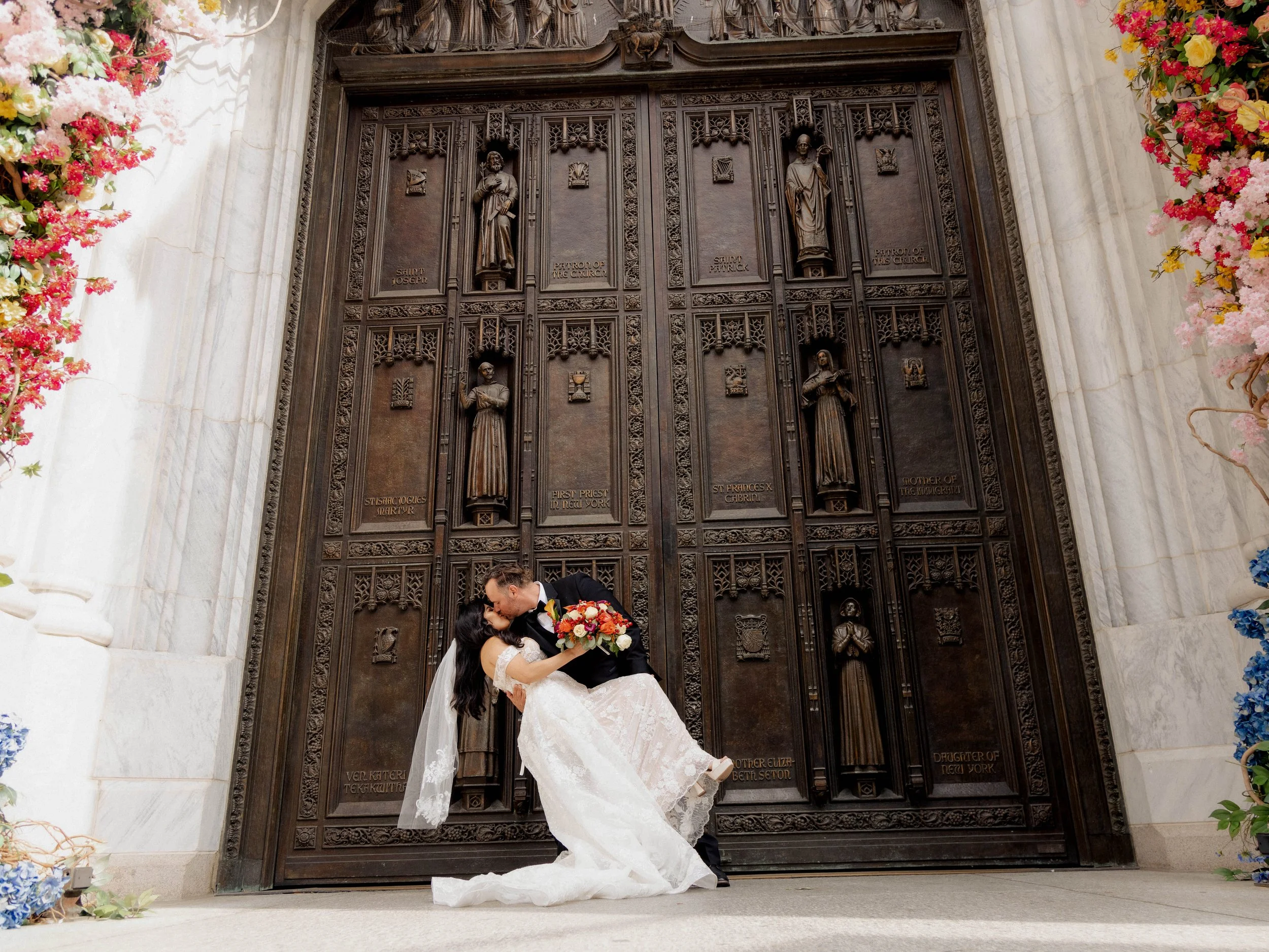 Radiant newlyweds outside St. Patrick's Cathedral after the wedding ceremony, capturing a magical moment of celebration and love.