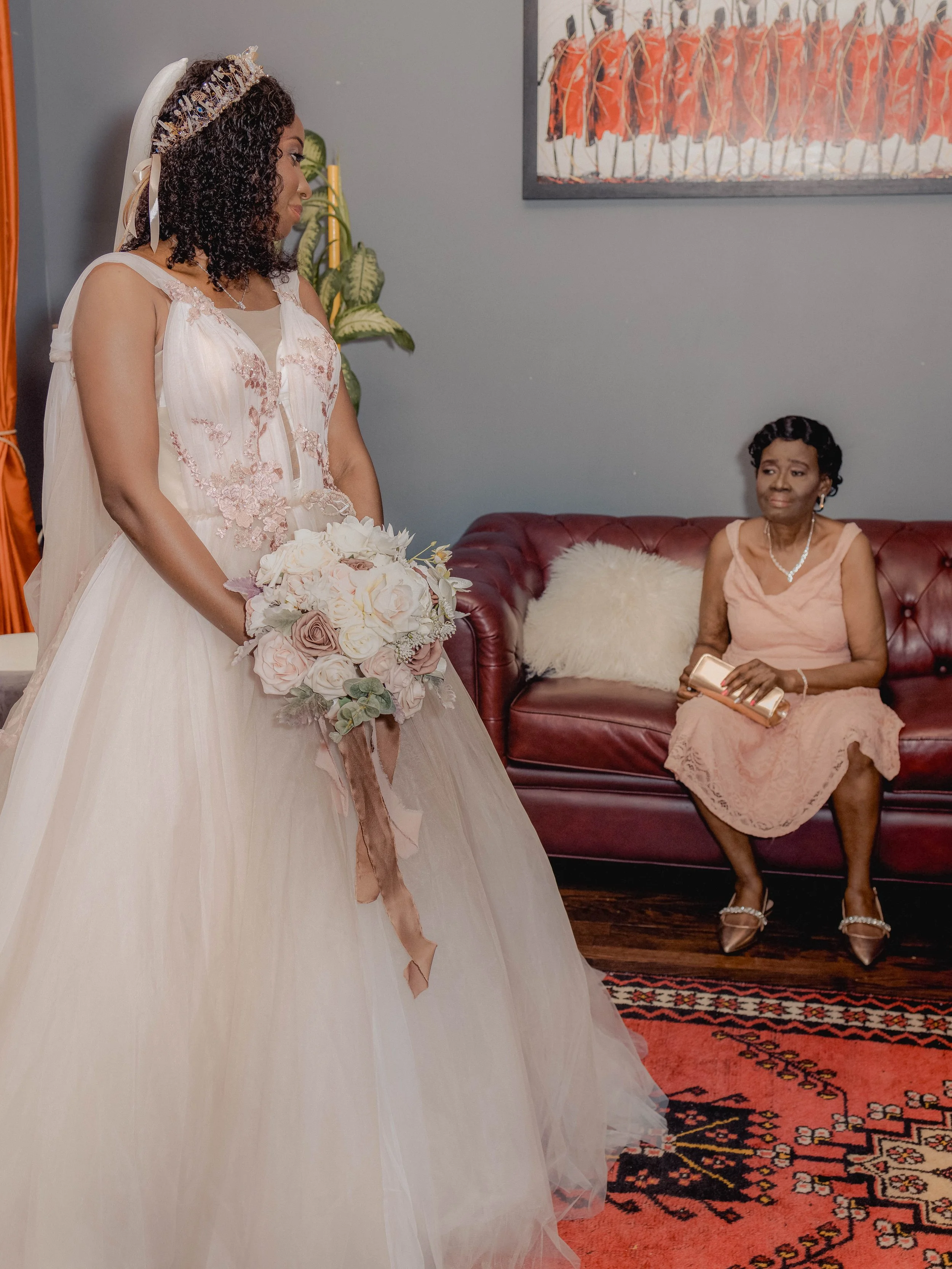 A bride and her mother sharing a tender moment