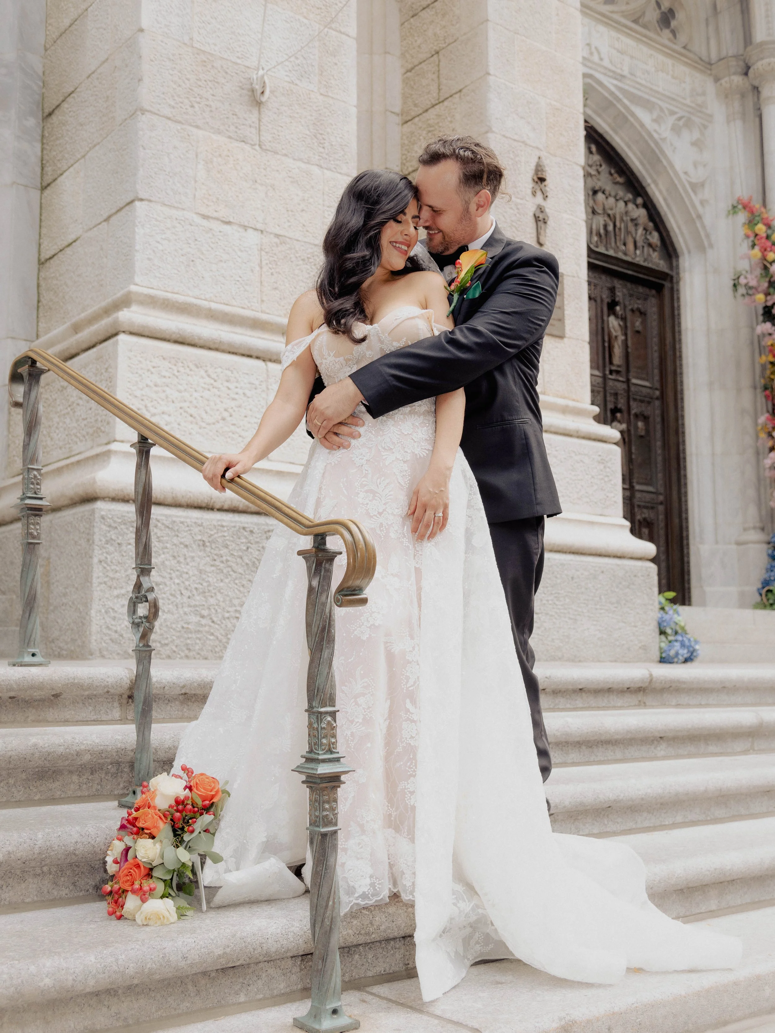 Radiant newlyweds outside St. Patrick's Cathedral after the wedding ceremony, capturing a magical moment of celebration and love.