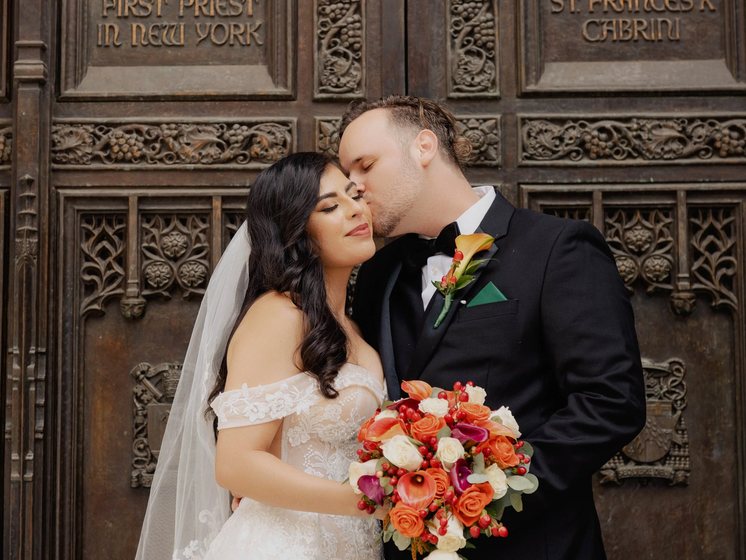 Radiant newlyweds outside St. Patrick's Cathedral after the wedding ceremony, capturing a magical moment of celebration and love.