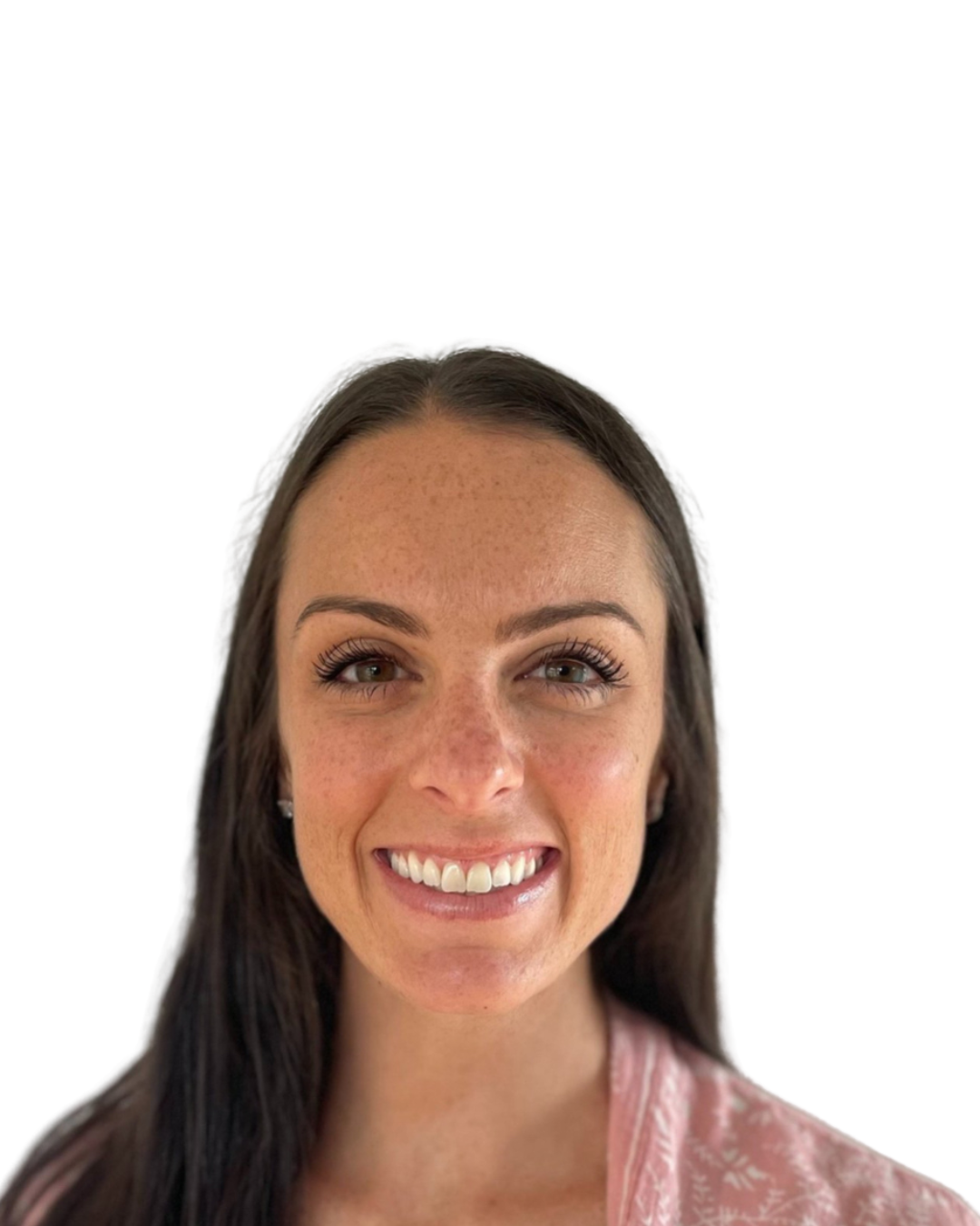 Smiling woman with long dark hair wearing a pink patterned shawl over a white top.