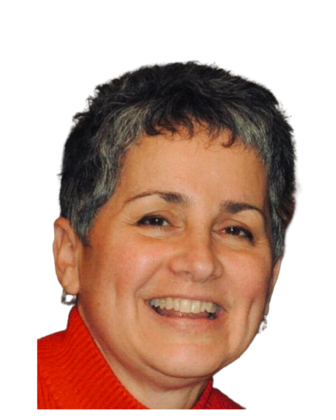 Smiling person in a red sweater with short gray hair.