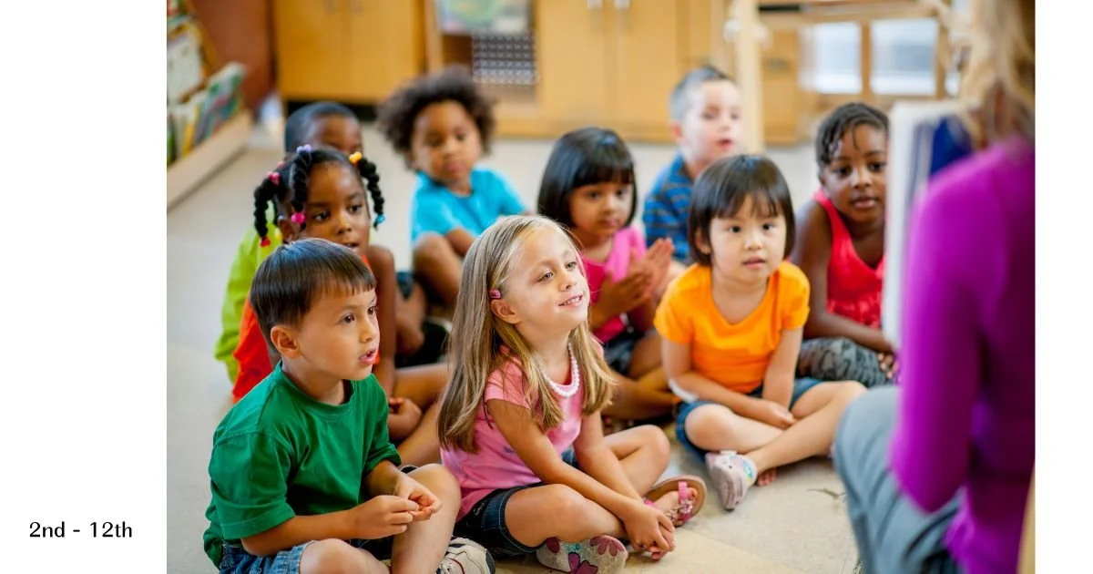 children sitting next to each other on classroom floor