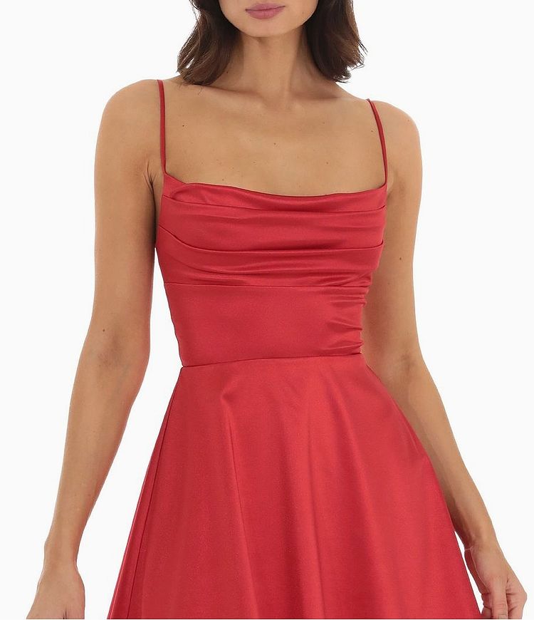 Close-up of red satin cowl neck mini dress showing smooth fabric and fit.