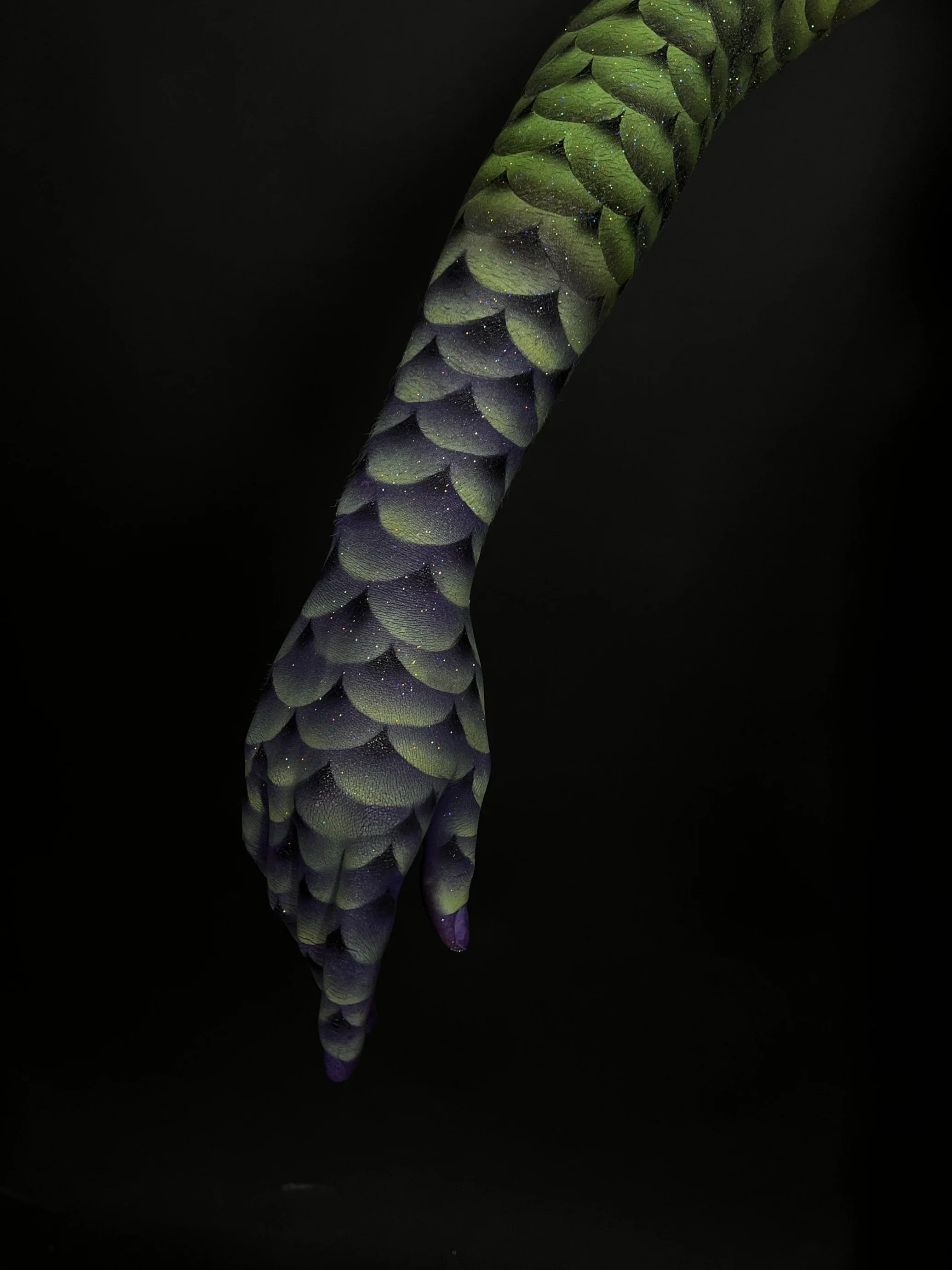 mermaid scale illusion body paint on arm