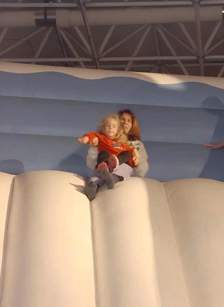 2003 sliding down an inflatable at Navy Pier