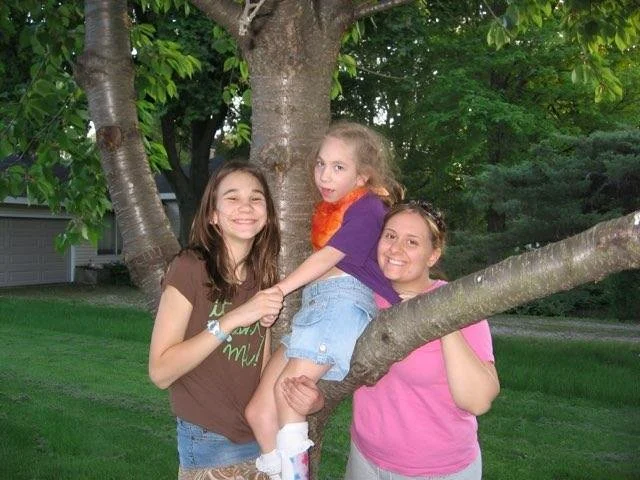 2009 climbing a tree with Marina and Sam