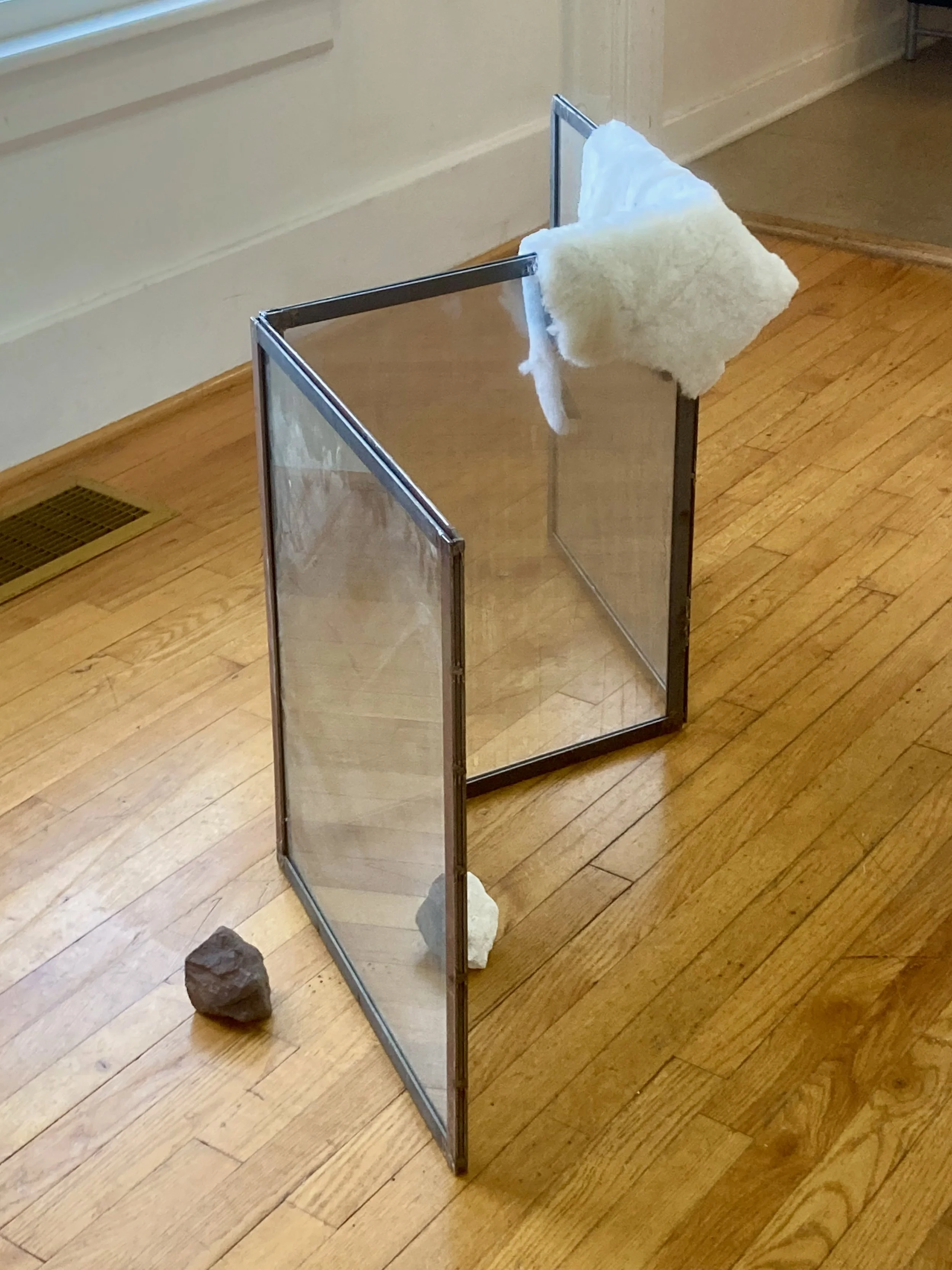 Ron Lambert, Wolf In Sheeps..., Rock, plaster, steel, glass, sheep skin, 60 x 24 x 24 inches, 2024, $4500