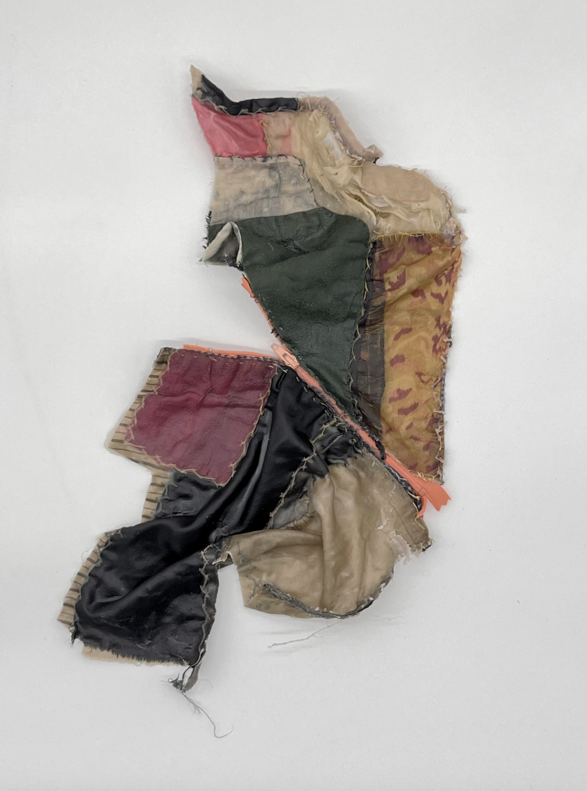 Christy Nelson, Repair, Salvaged 110 year old quilt section and zipper in encaustic, 15 x 12 x 2 inches, 2026