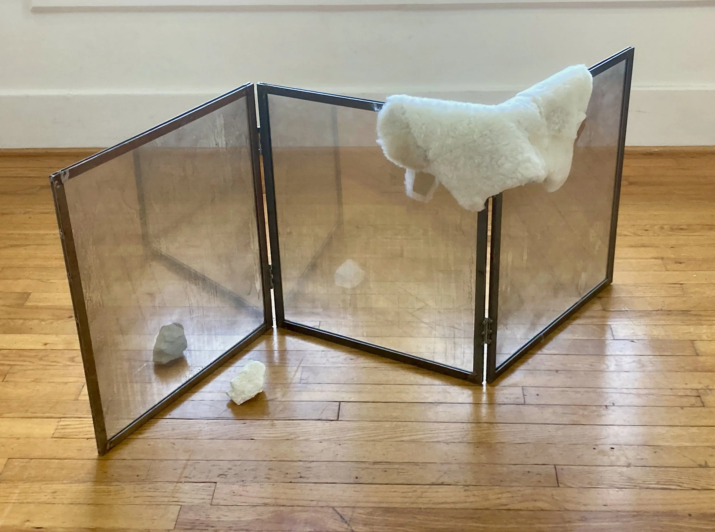 Ron Lambert, Wolf In Sheeps..., Rock, plaster, steel, glass, sheep skin, 60 x 24 x 24 inches, 2024, $4500