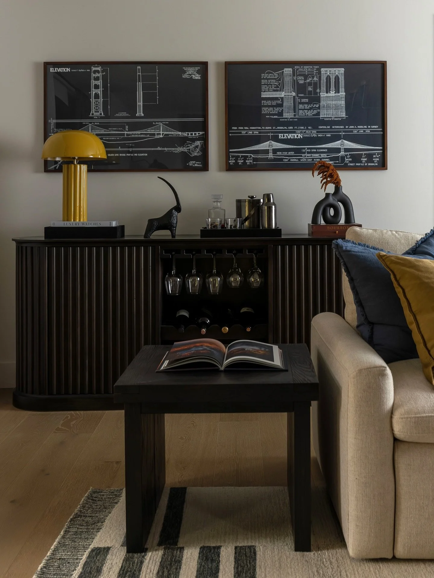 This room is full of intentional touches, from the custom liquor sideboard by @customcottageindy to the steel beam drawings that hint at the homeowner&rsquo;s career. Josie prefers a moody, dramatic feel and I loved leaning into that style for this s
