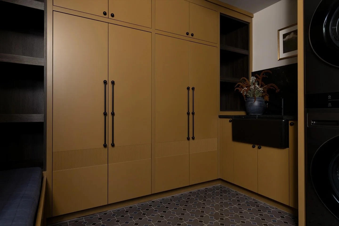 Laundry, but make it editorial. Obsessed with this moody palette + statement tile moment from @josiekeainteriors 

Design @josiekeainteriors 
Cabinetry @finelinemillworks 
Hardware @sandiegohardware 
Photo @indymediaco 

#IndianapolisInteriorPhotogra