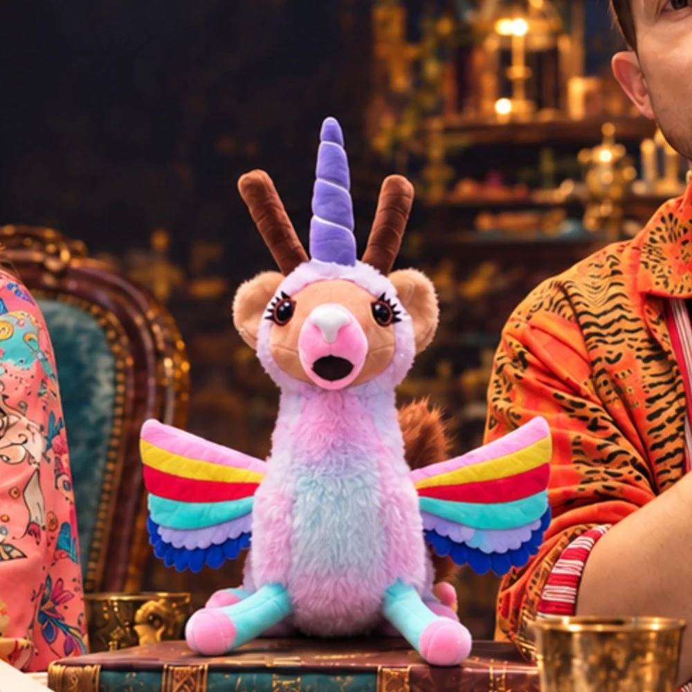 Llamacorn plush with rainbow wings